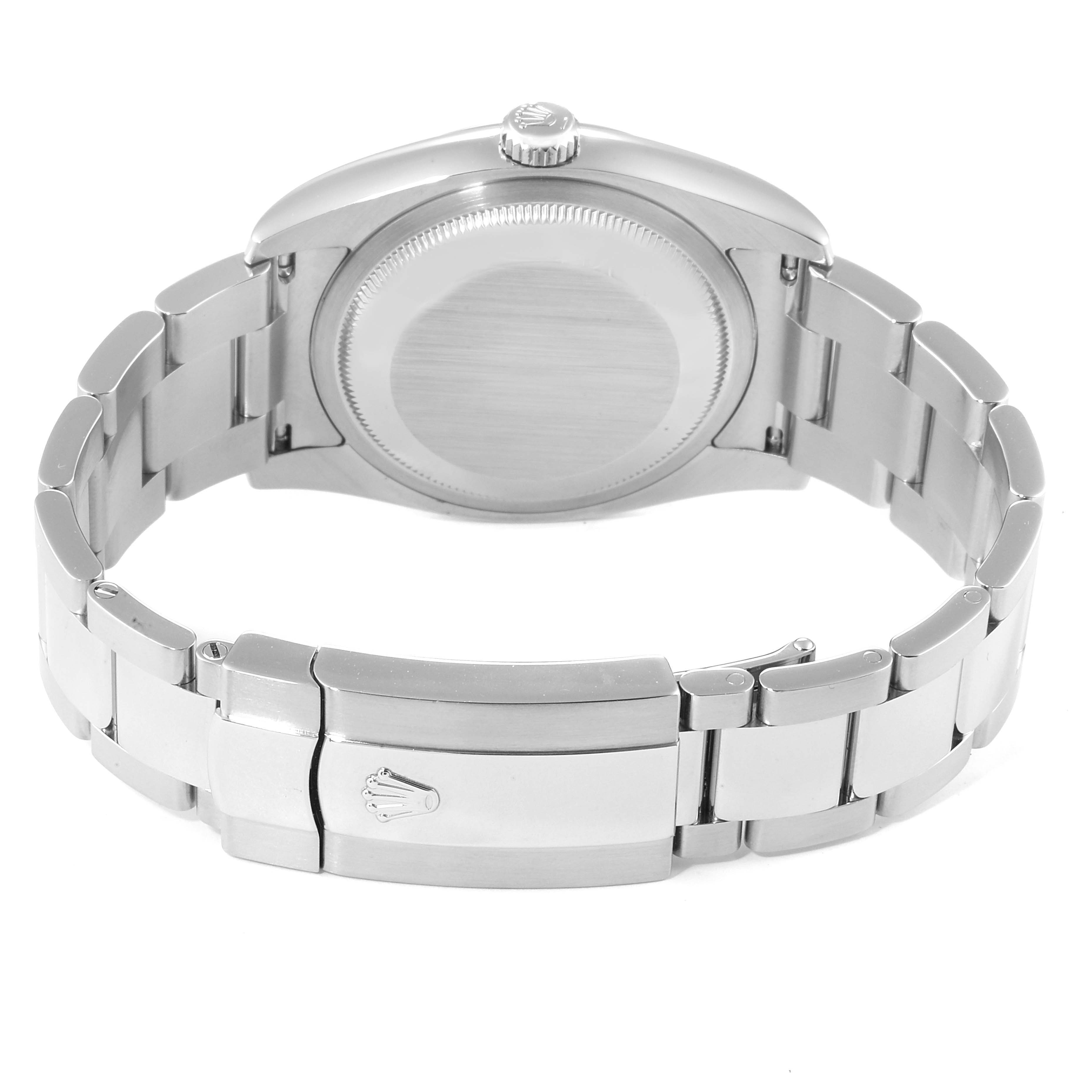 The image shows the back angle of a Rolex Datejust 116200  Men's Stainless Steel Black Dial 116200  Men's Stainless Steel Black Dial watch, highlighting the case back and metal bracelet with the Rolex logo on the clasp.