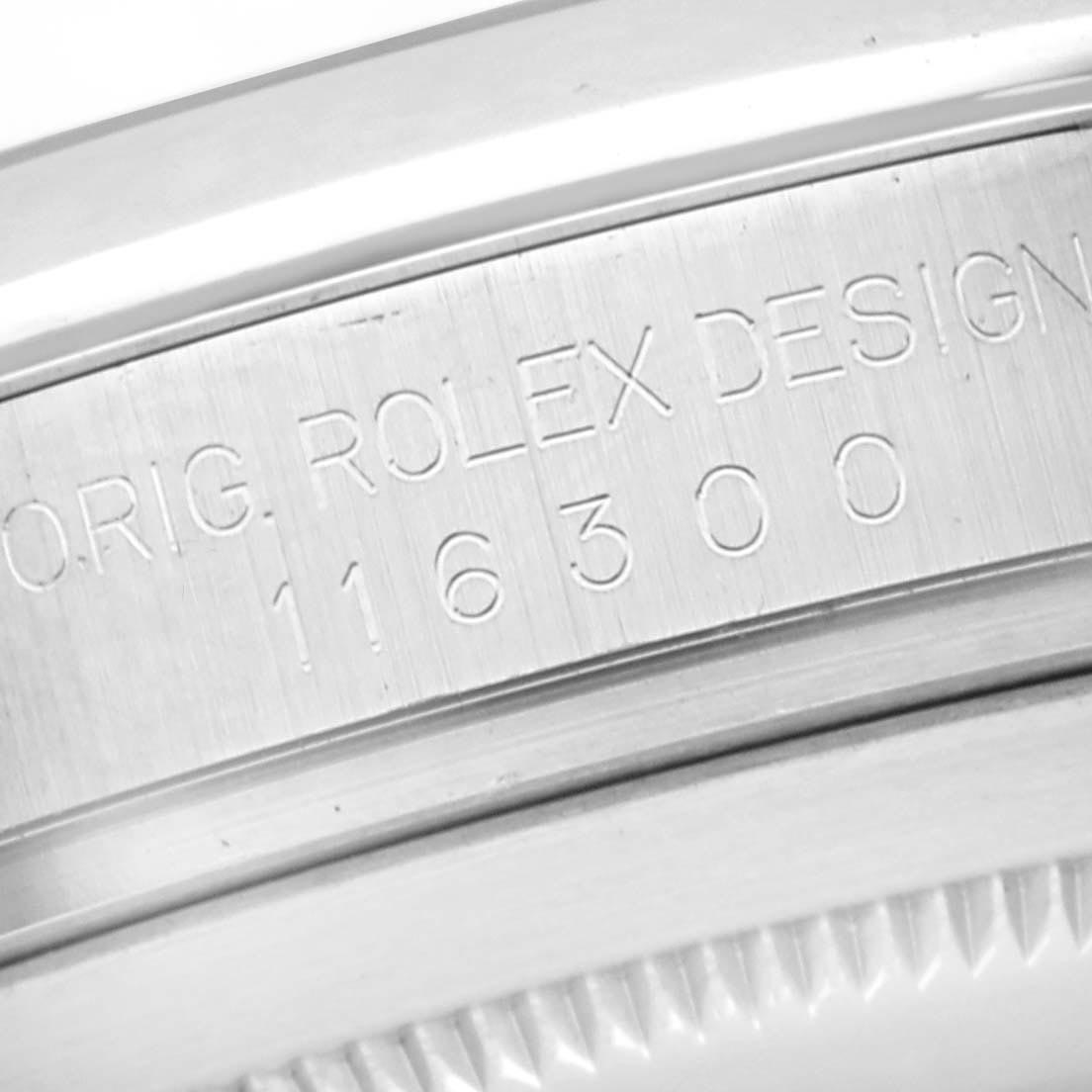The image shows a close-up of the Rolex Datejust 41 116300 Men's Stainless Steel Silver Dial 116300 Men's Stainless Steel Silver Dial model's case side, highlighting its engraved design details.