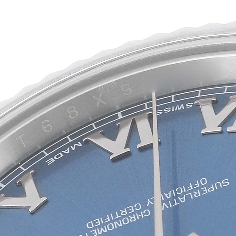 This is a close-up of the dial and part of the bezel of a Rolex Datejust 41 116334 Men
s Stainless Steel Blue Dial 116334 Men
s Stainless Steel Blue Dial watch.