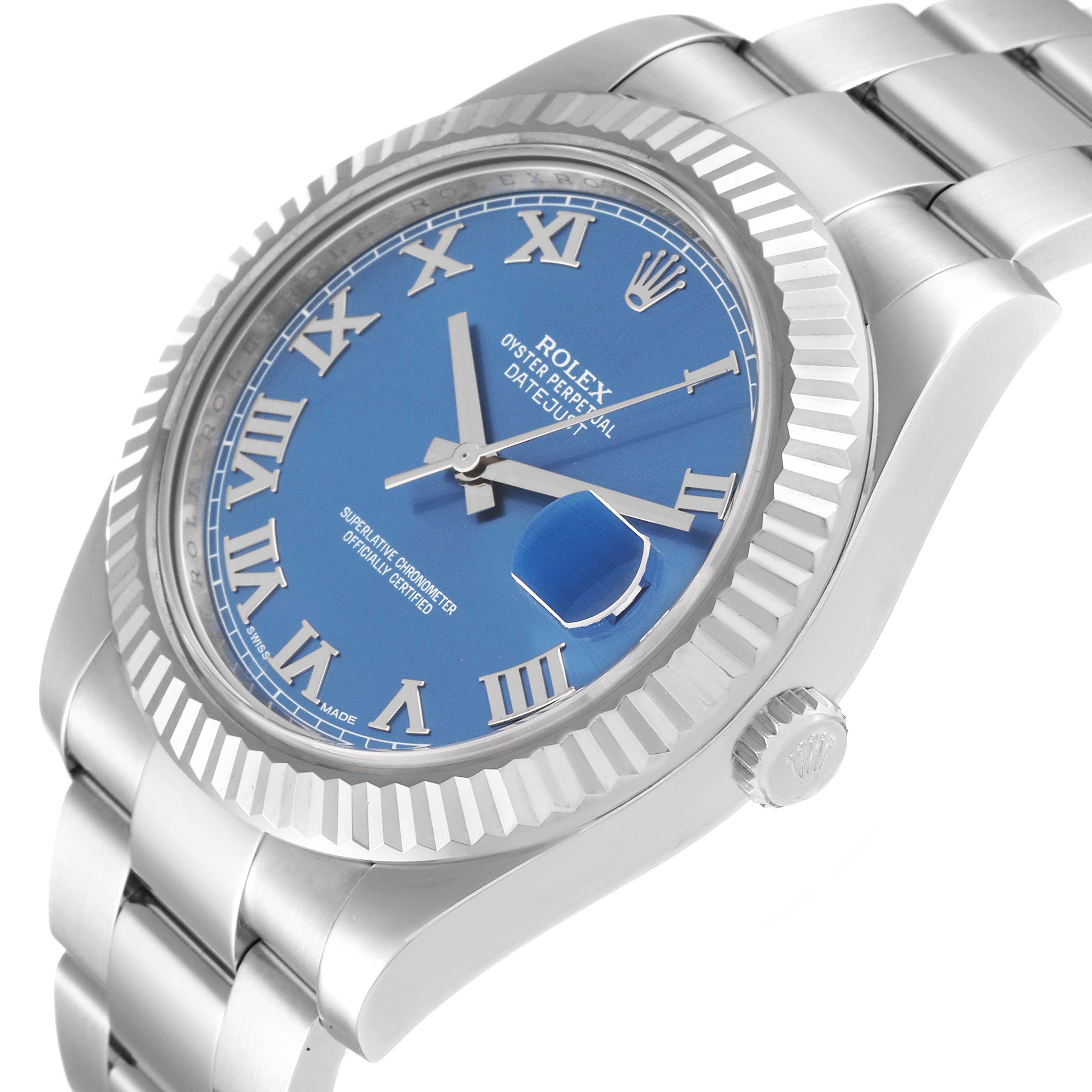 The image shows a Rolex Datejust 41 116334 Men
s Stainless Steel Blue Dial 116334 Men
s Stainless Steel Blue Dial watch from a slight side angle, highlighting the dial, bezel, and a portion of the bracelet.