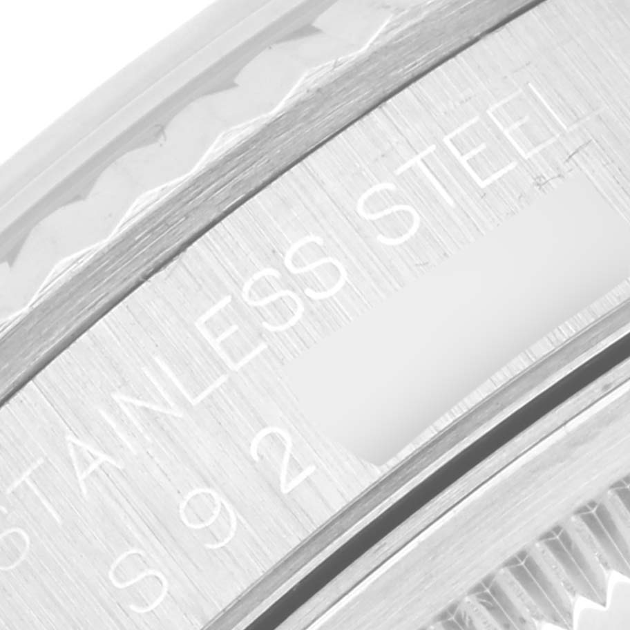 This image shows a close-up of the bezel and case edge of a Rolex Datejust 16234 Men's Stainless Steel Silver Dial 16234 Men's Stainless Steel Silver Dial watch, highlighting the "Stainless Steel" engraving.