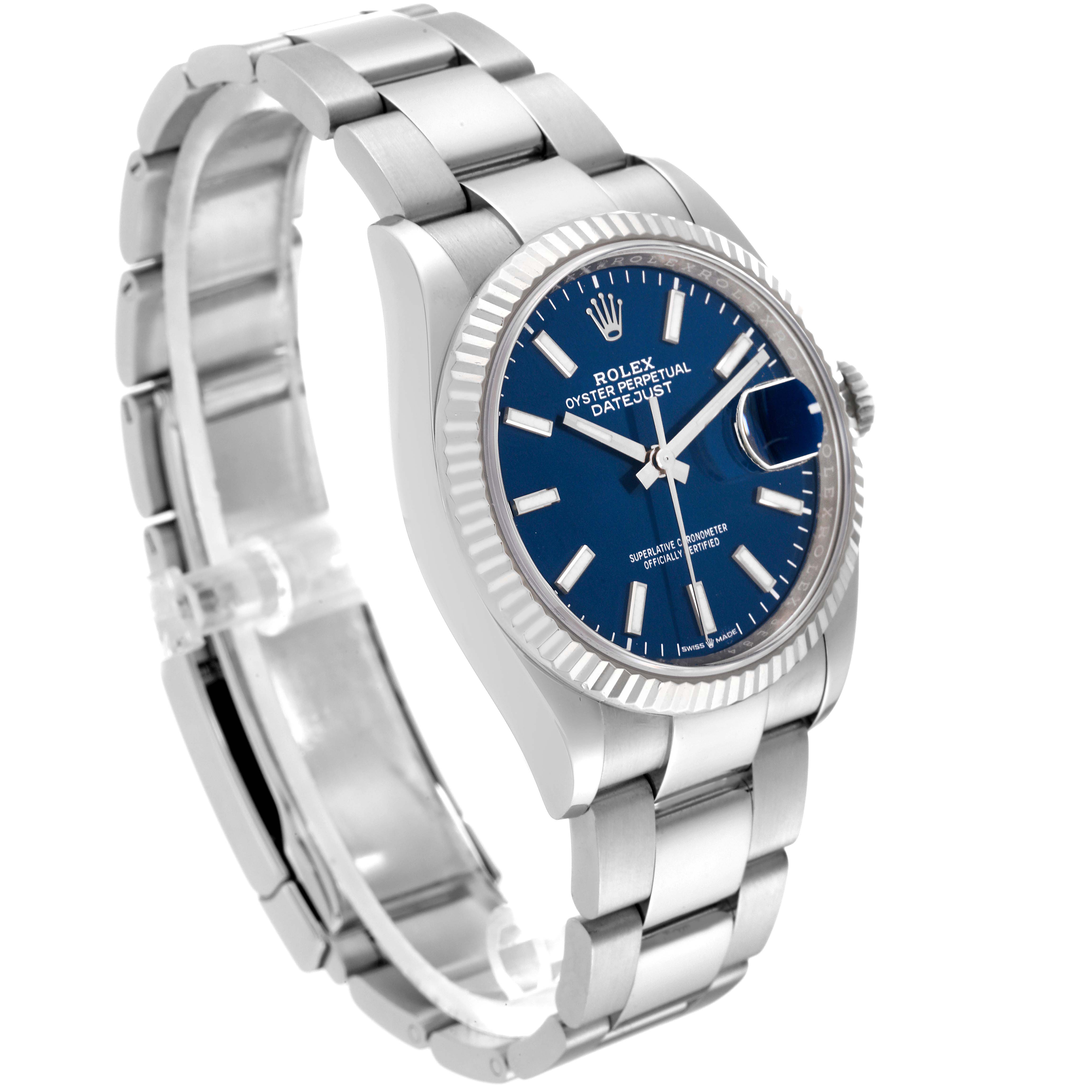The image shows a side angle of a Rolex Datejust 126234 Men's Stainless Steel Blue Dial 126234 Men's Stainless Steel Blue Dial watch, displaying the dial, fluted bezel, bracelet, and crown.