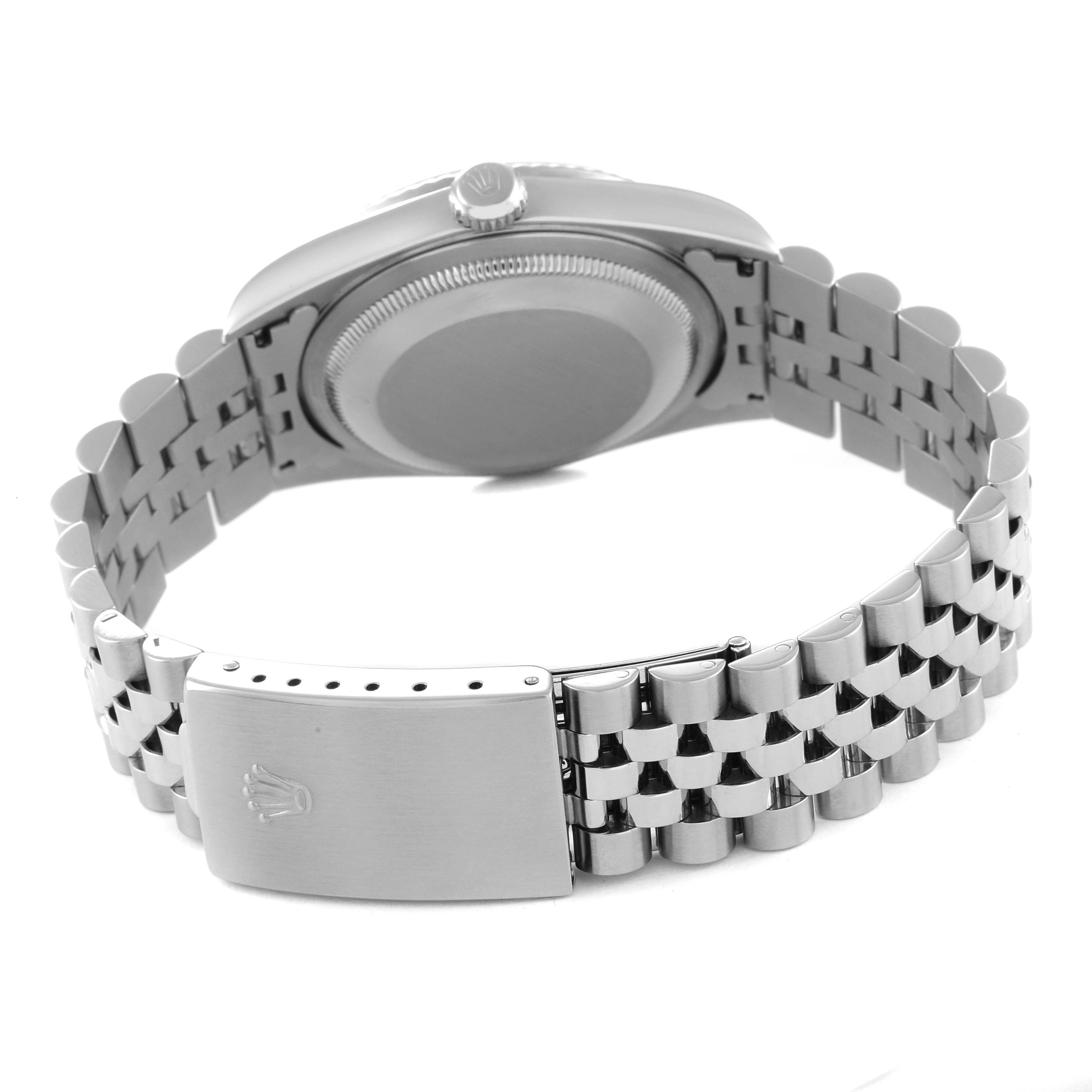 The image shows a rear-angle view of a Rolex Datejust 16234 Men's Stainless Steel Mother of Pearl Dial 16234 Men's Stainless Steel Mother of Pearl Dial watch, highlighting the back casing and Jubilee bracelet clasp.