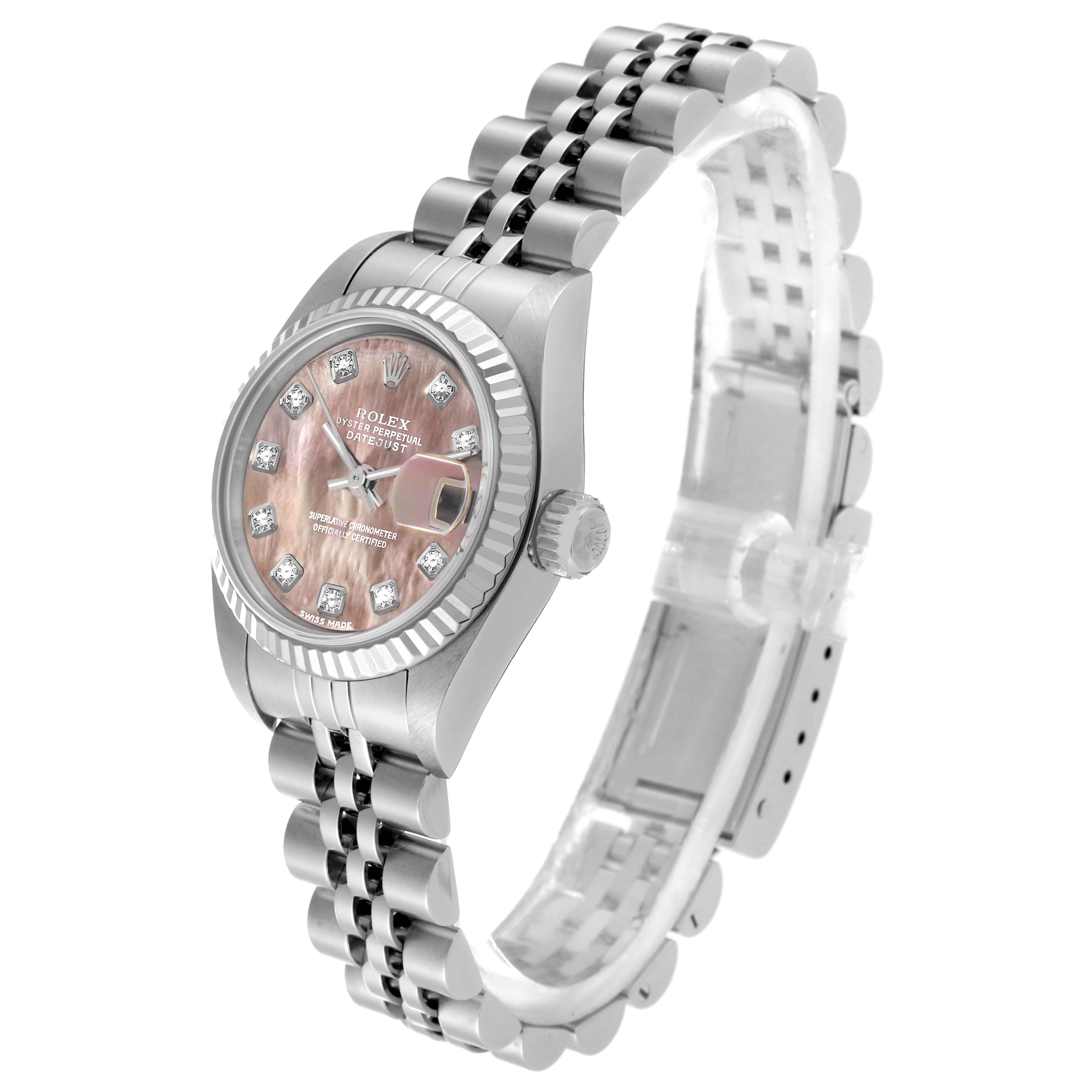 The image shows a Rolex Datejust 179174 Women
s Stainless Steel Mother of Pearl Dial 179174 Women
s Stainless Steel Mother of Pearl Dial watch at a 45-degree angle, displaying the dial, crown, and bracelet.