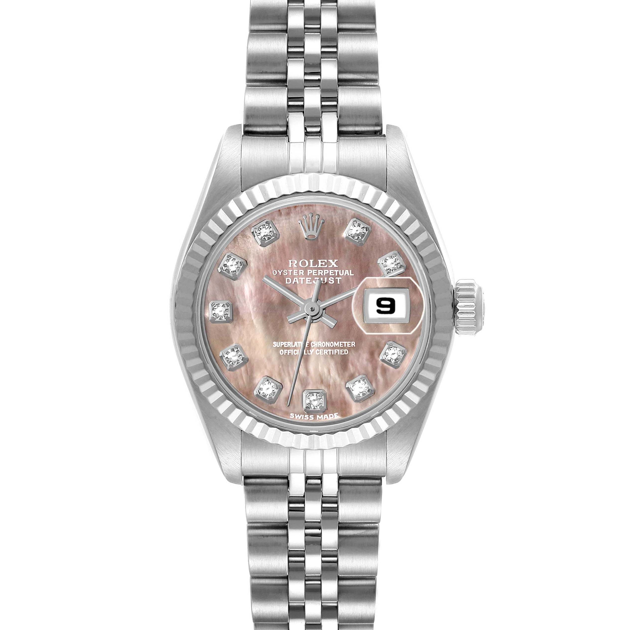 The image shows a Rolex Datejust 179174 Women
s Stainless Steel Mother of Pearl Dial 179174 Women
s Stainless Steel Mother of Pearl Dial watch from a front angle, displaying its dial, fluted bezel, diamond hour markers, and Jubilee bracelet.