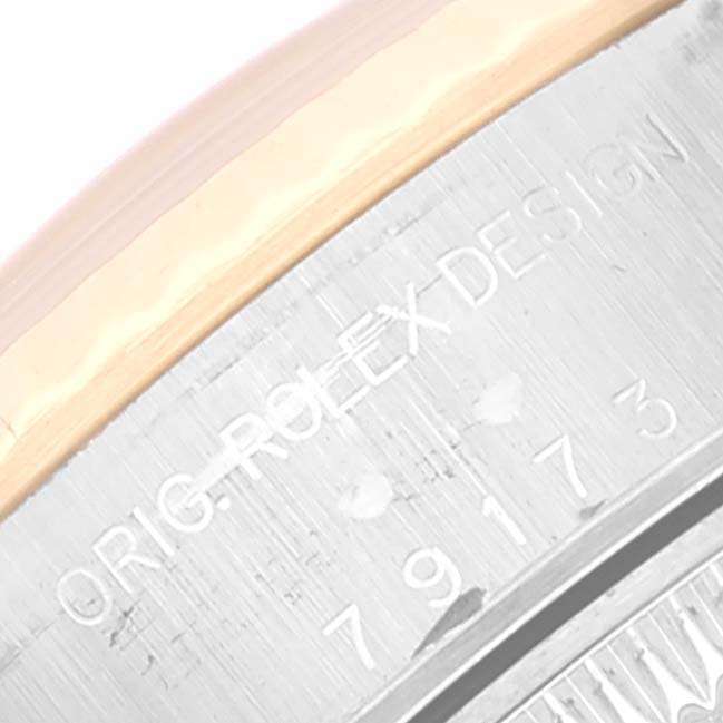 This is a close-up of the original Rolex design engraving on the bezel of the Rolex Datejust 79173 Women's Steel and Gold (two tone) Blue Dial 79173 Women's Steel and Gold (two tone) Blue Dial watch.