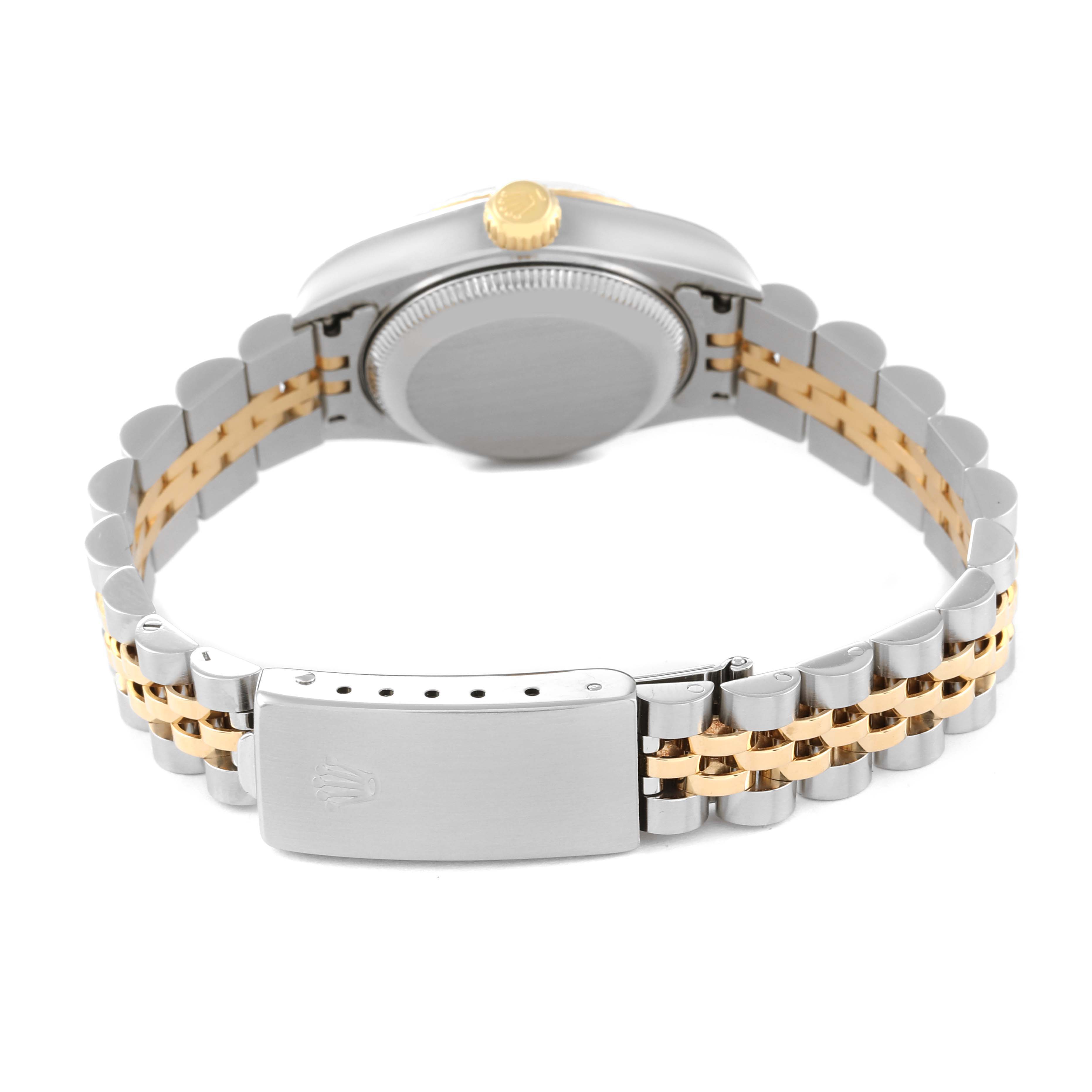 The image shows the back view of a Rolex Datejust 79173 Women's Steel and Gold (two tone) Blue Dial 79173 Women's Steel and Gold (two tone) Blue Dial watch, highlighting the case back, crown, and bi-color bracelet with clasp.