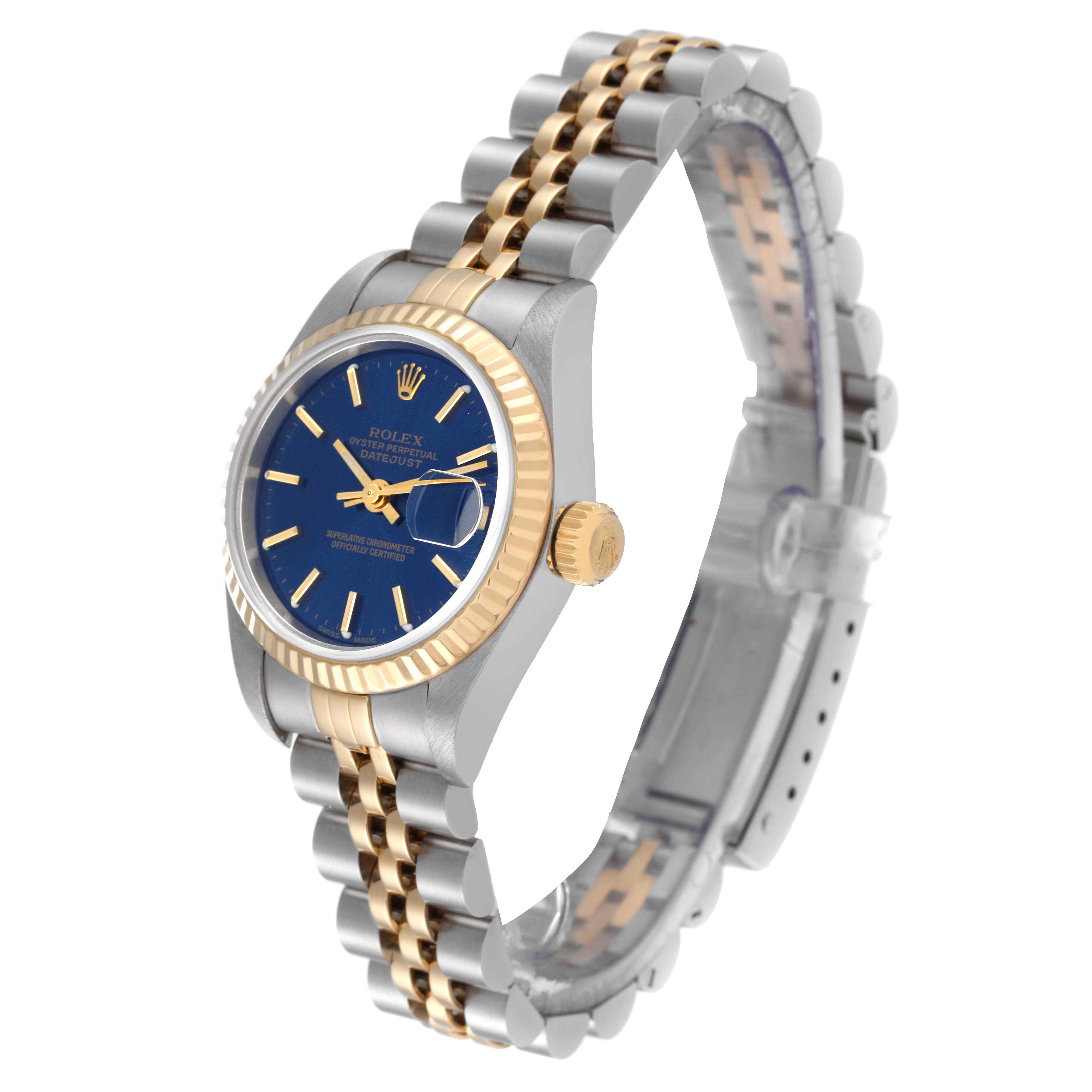 The image shows a Rolex Datejust 79173 Women's Steel and Gold (two tone) Blue Dial 79173 Women's Steel and Gold (two tone) Blue Dial watch at a slight side angle, highlighting its blue dial, gold fluted bezel, and two-tone bracelet.