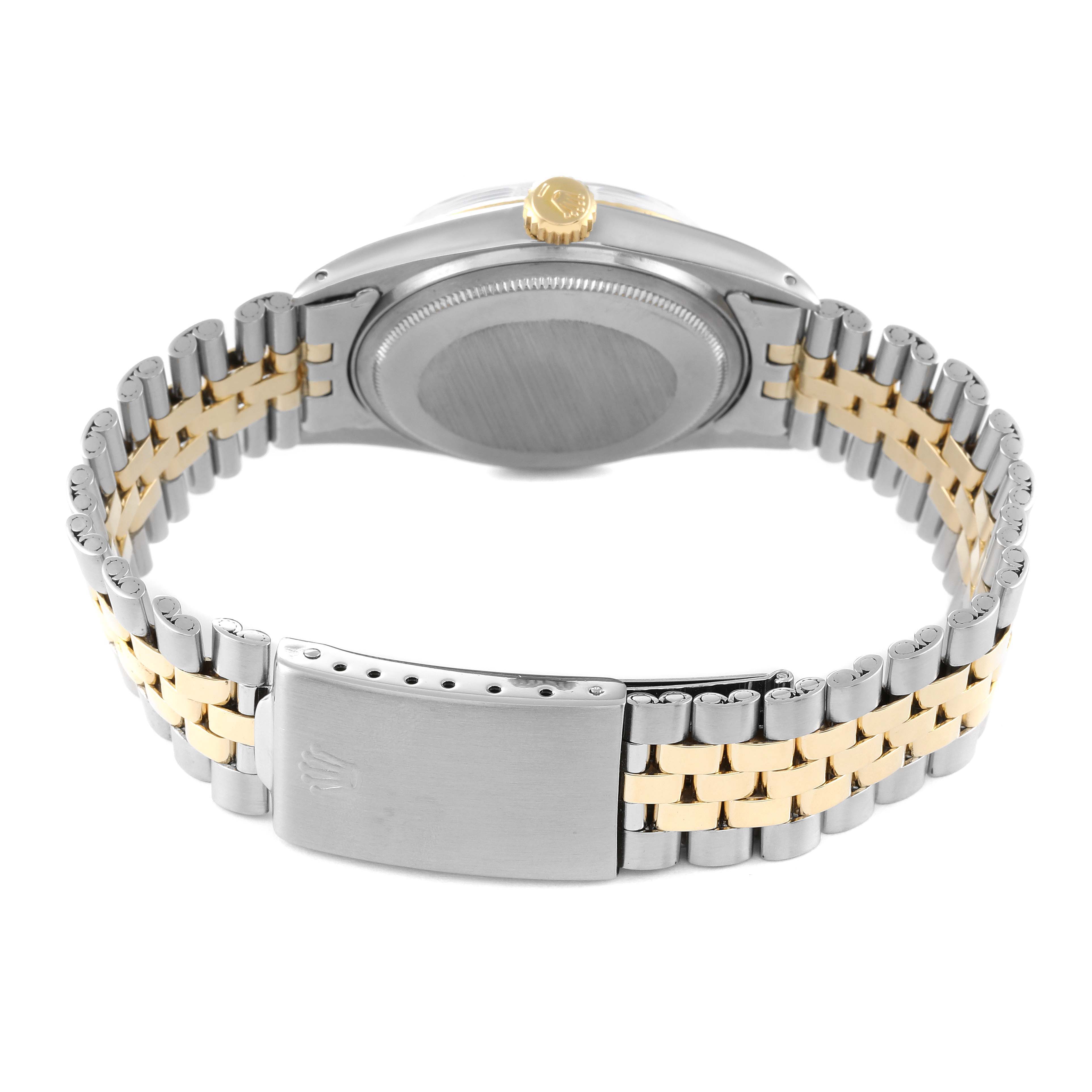 The image shows the back view of a Rolex Datejust 1601 Men's Steel and Gold (two tone) Brown Dial 1601 Men's Steel and Gold (two tone) Brown Dial watch, focusing on the case, crown, and two-tone bracelet.