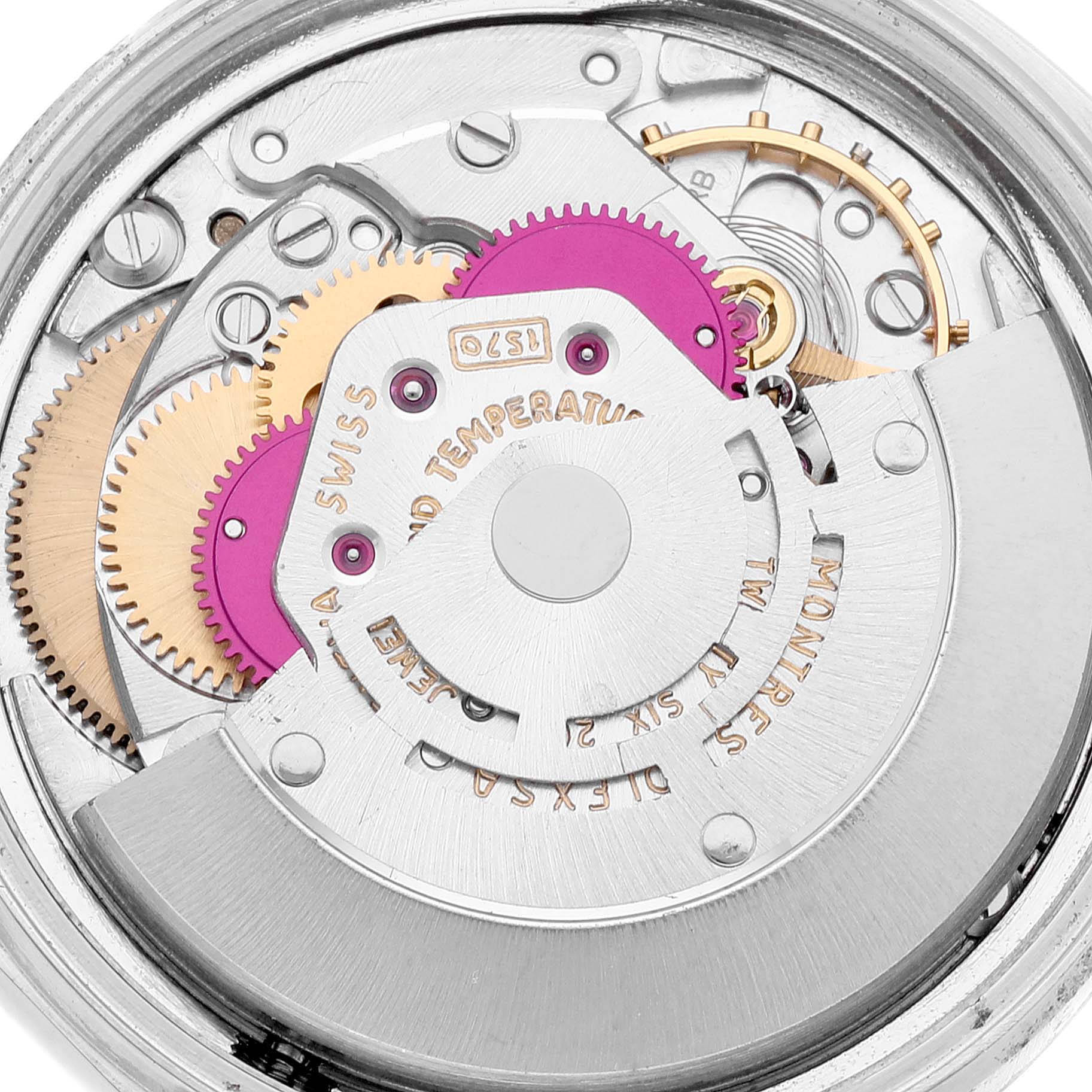 This image shows the internal mechanism and gears of a Rolex Datejust 1601 Men's Steel and Gold (two tone) Brown Dial 1601 Men's Steel and Gold (two tone) Brown Dial watch from a close-up angle.