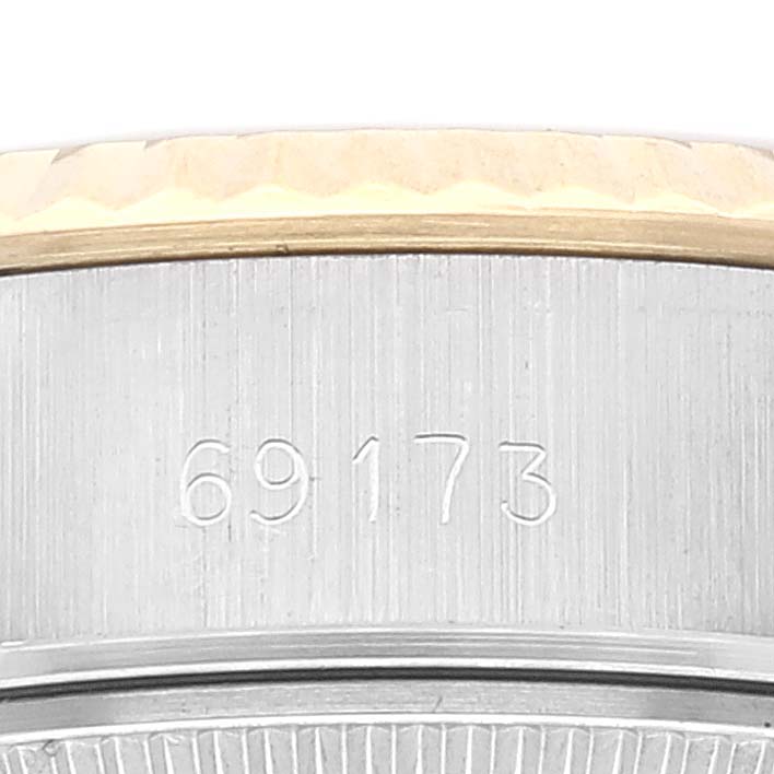 This image shows a close-up of the model number "69173" on the case side of a Rolex Datejust 69173 Women's Steel and Gold (two tone) Champagne Dial 69173 Women's Steel and Gold (two tone) Champagne Dial watch.