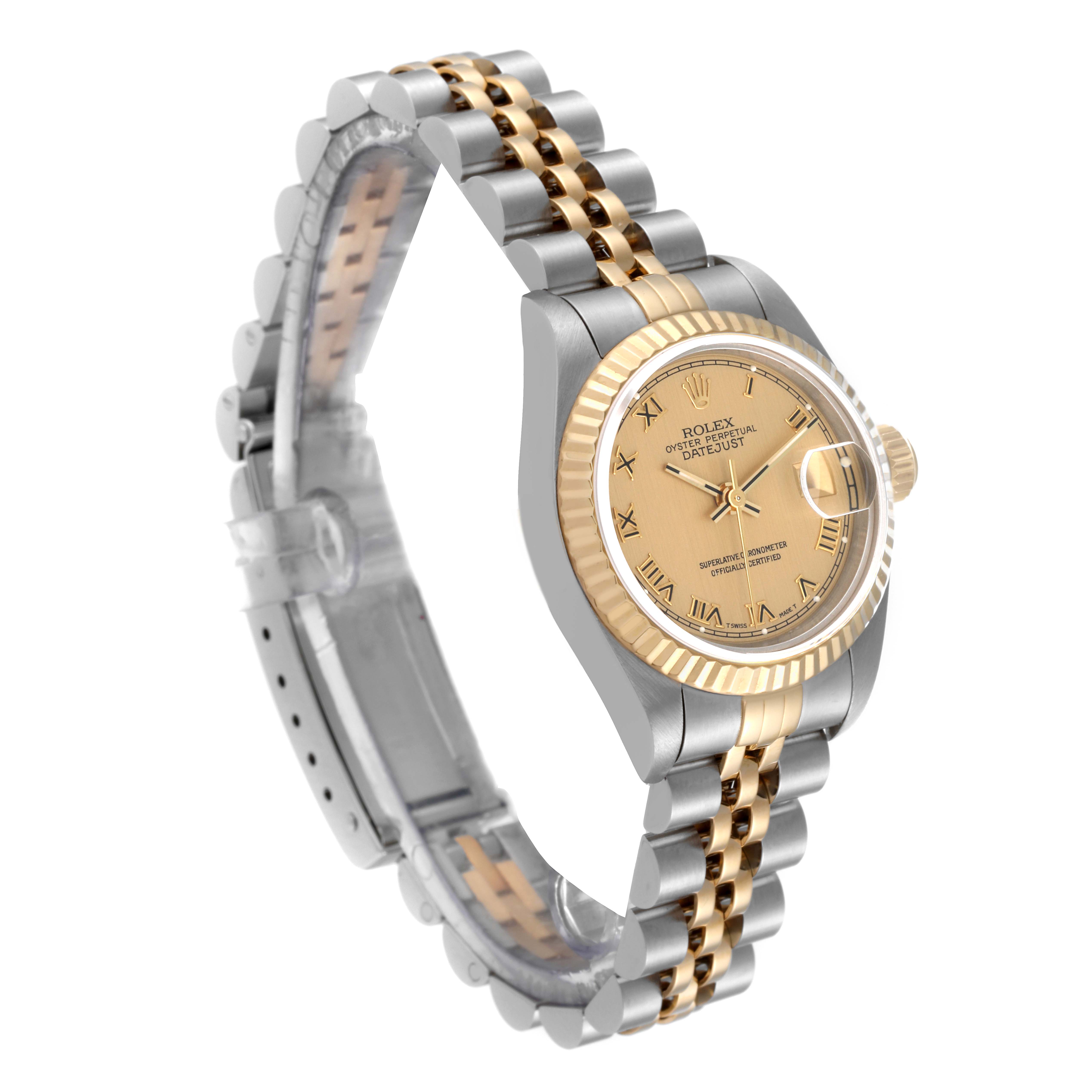 The Rolex Datejust 69173 Women's Steel and Gold (two tone) Champagne Dial 69173 Women's Steel and Gold (two tone) Champagne Dial model is shown at a three-quarter angle, displaying the gold dial, bezel, and two-tone bracelet.