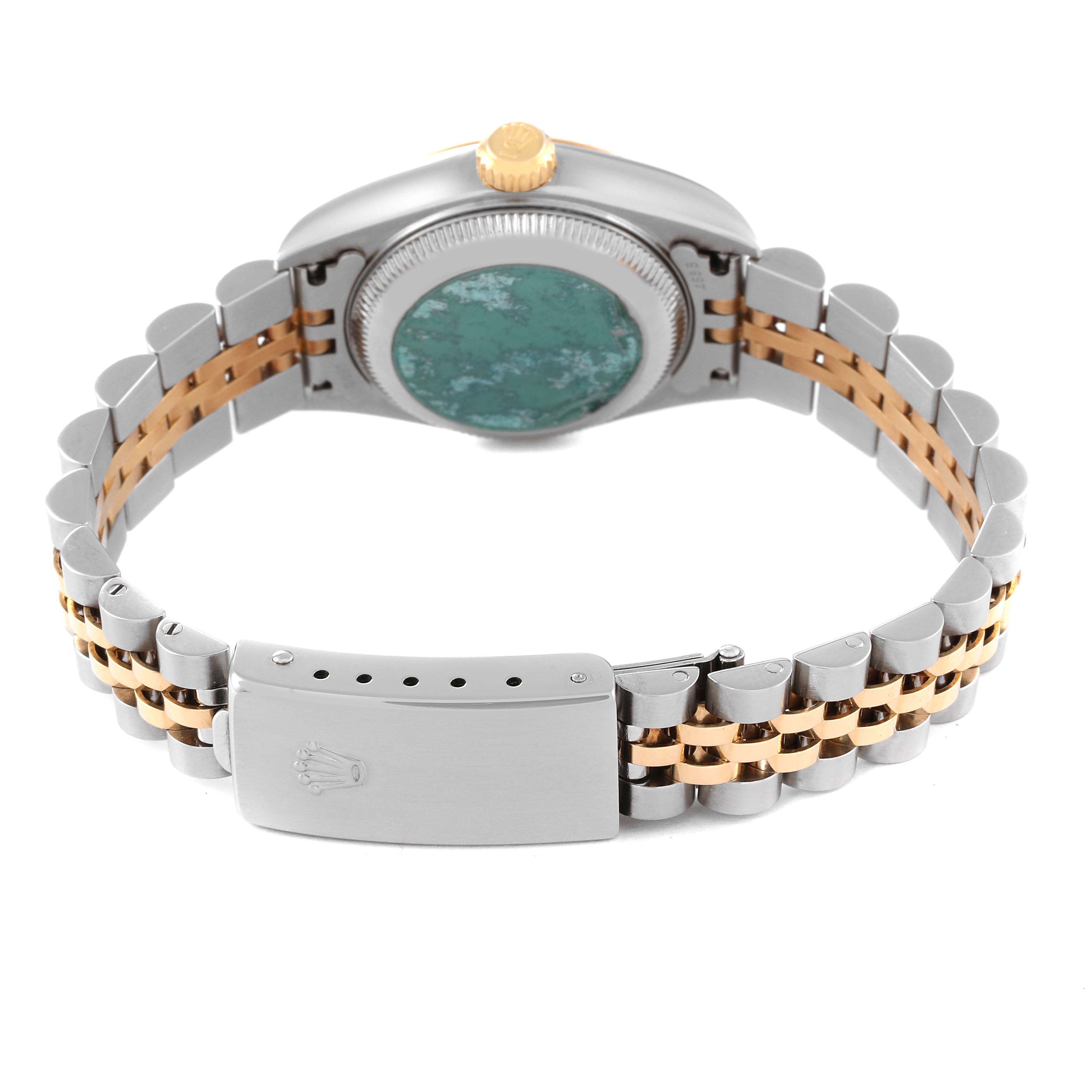 The image shows the back view of a Rolex Datejust 79173 Women's Steel and Gold (two tone) Blue Dial 79173 Women's Steel and Gold (two tone) Blue Dial watch, displaying its clasp, bracelet, and partially obscured case back.