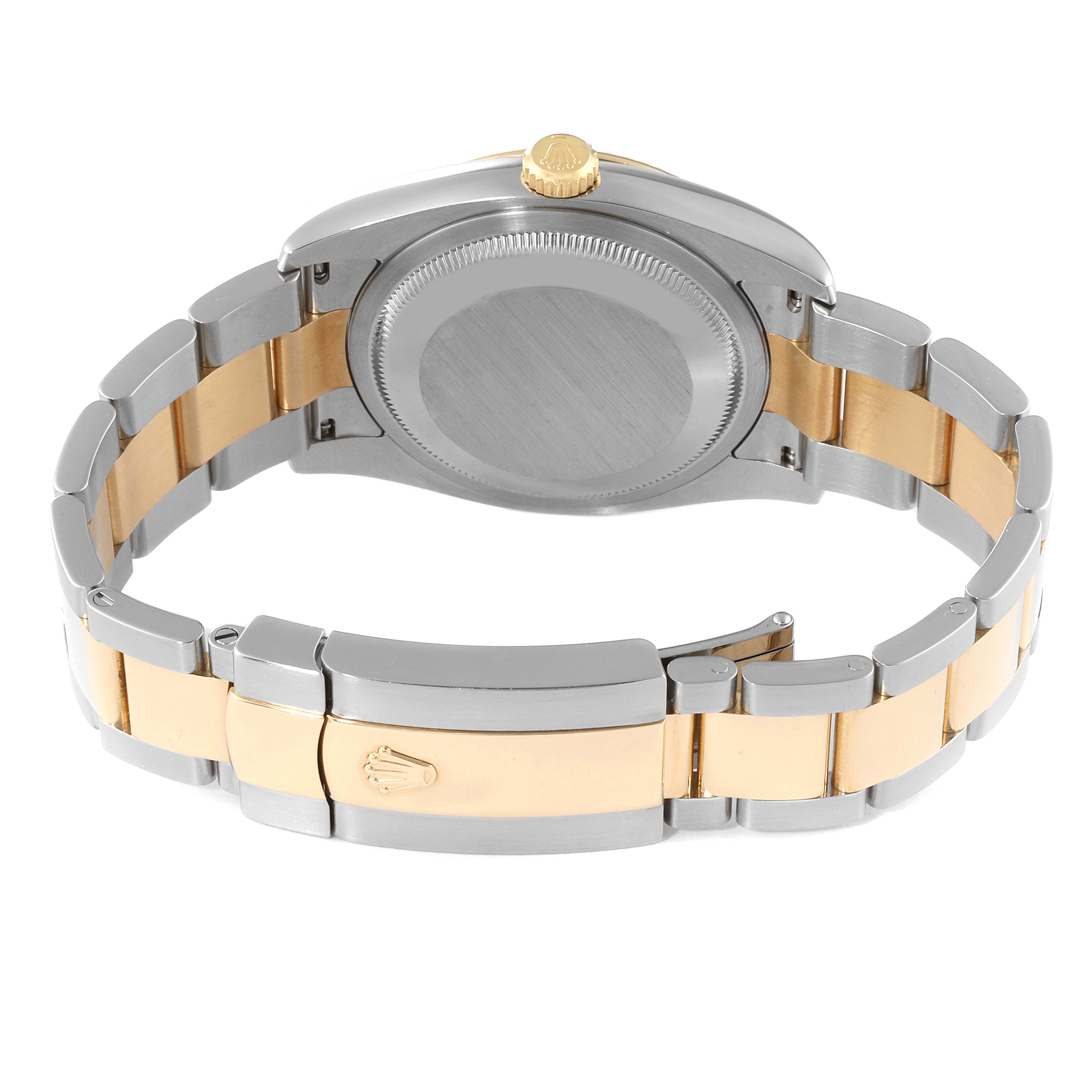 The image shows the back view of a Rolex Datejust 116233 Men's Steel and Gold (two tone) Silver Dial 116233 Men's Steel and Gold (two tone) Silver Dial watch, highlighting its case back, crown, and two-tone bracelet.