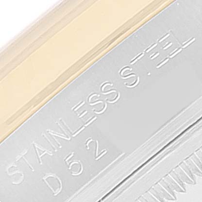 The image shows a close-up of the Rolex Datejust 116233 Men's Steel and Gold (two tone) Silver Dial 116233 Men's Steel and Gold (two tone) Silver Dial's stainless steel casing engraving.