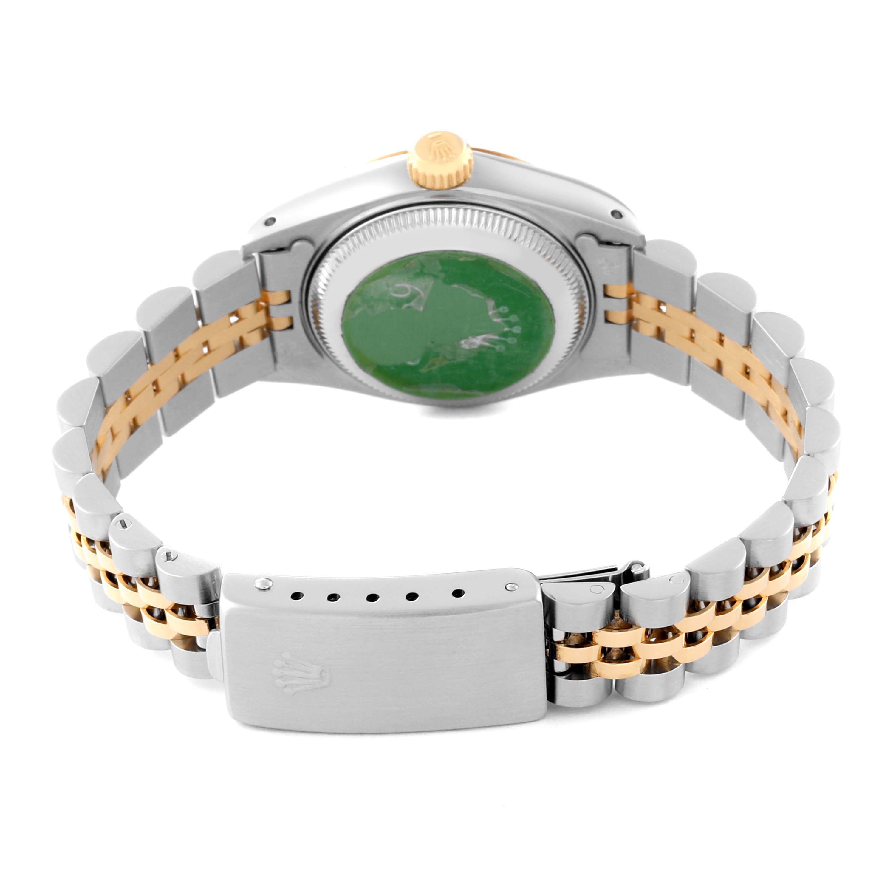 This image shows the back view of a Rolex Datejust 69173 Women's Steel and Gold (two tone) Champagne Dial 69173 Women's Steel and Gold (two tone) Champagne Dial watch, featuring its stainless steel and gold bracelet and closed clasp.