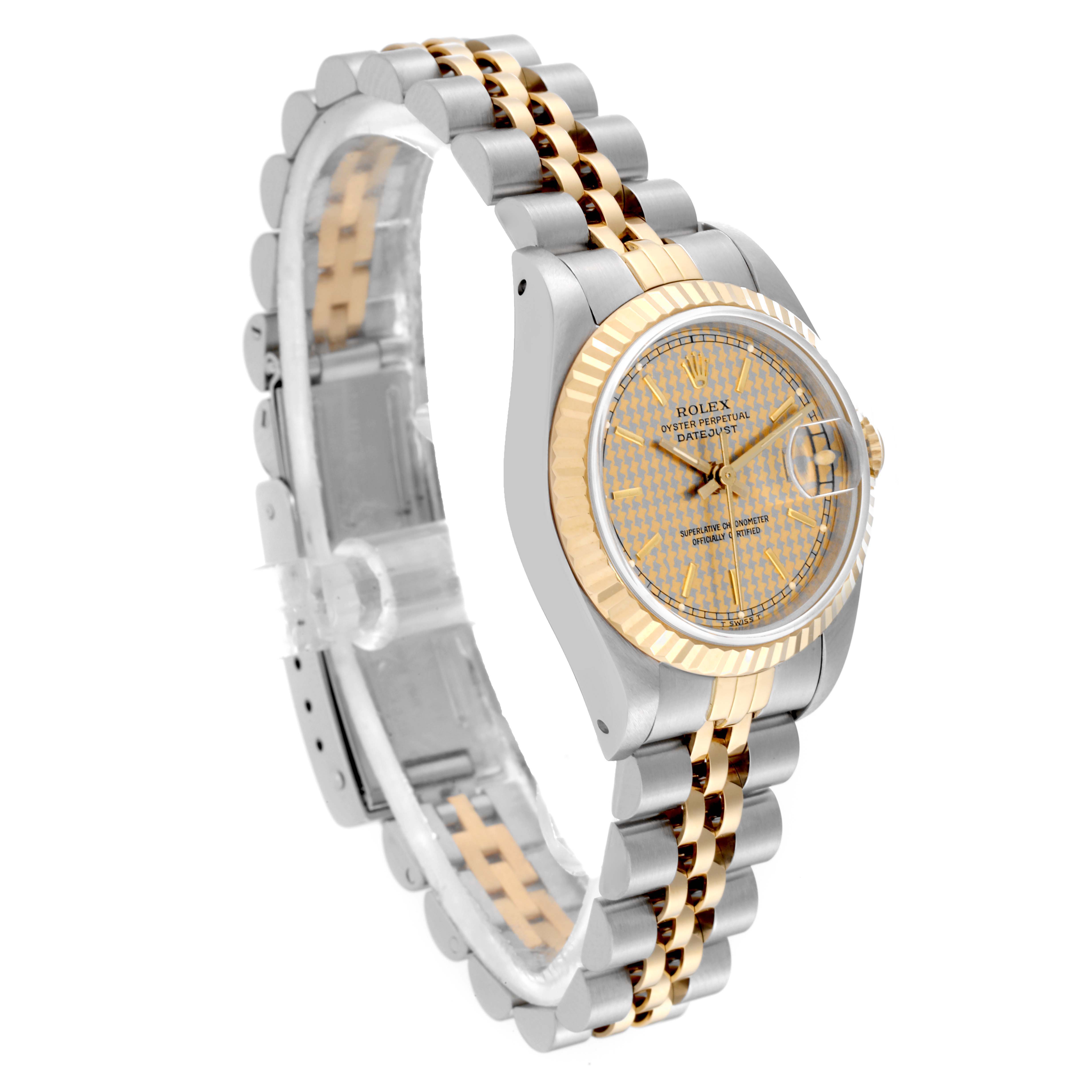 This Rolex Datejust 69173 Women's Steel and Gold (two tone) Champagne Dial 69173 Women's Steel and Gold (two tone) Champagne Dial watch is shown tilted slightly to the left, displaying the dial, bezel, and part of the bracelet.