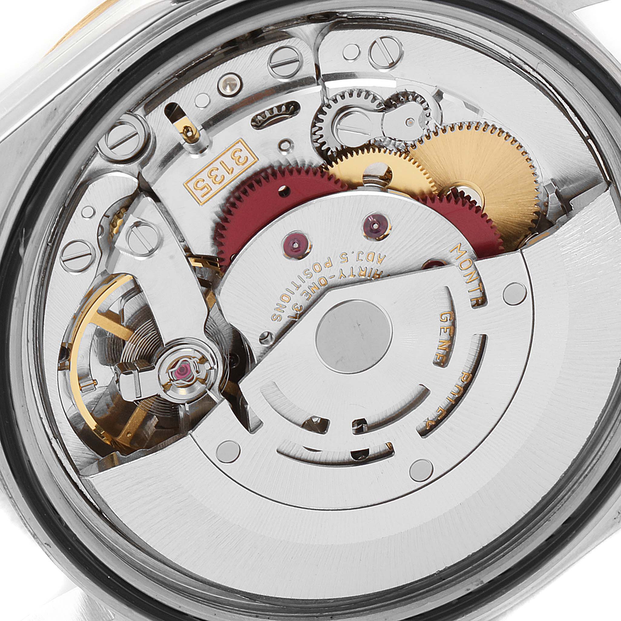 This image shows a close-up view of the movement mechanism of the Rolex Datejust 16233 Men's Steel and Gold (two tone) Mother of Pearl Dial 16233 Men's Steel and Gold (two tone) Mother of Pearl Dial watch, highlighting its gears and components.