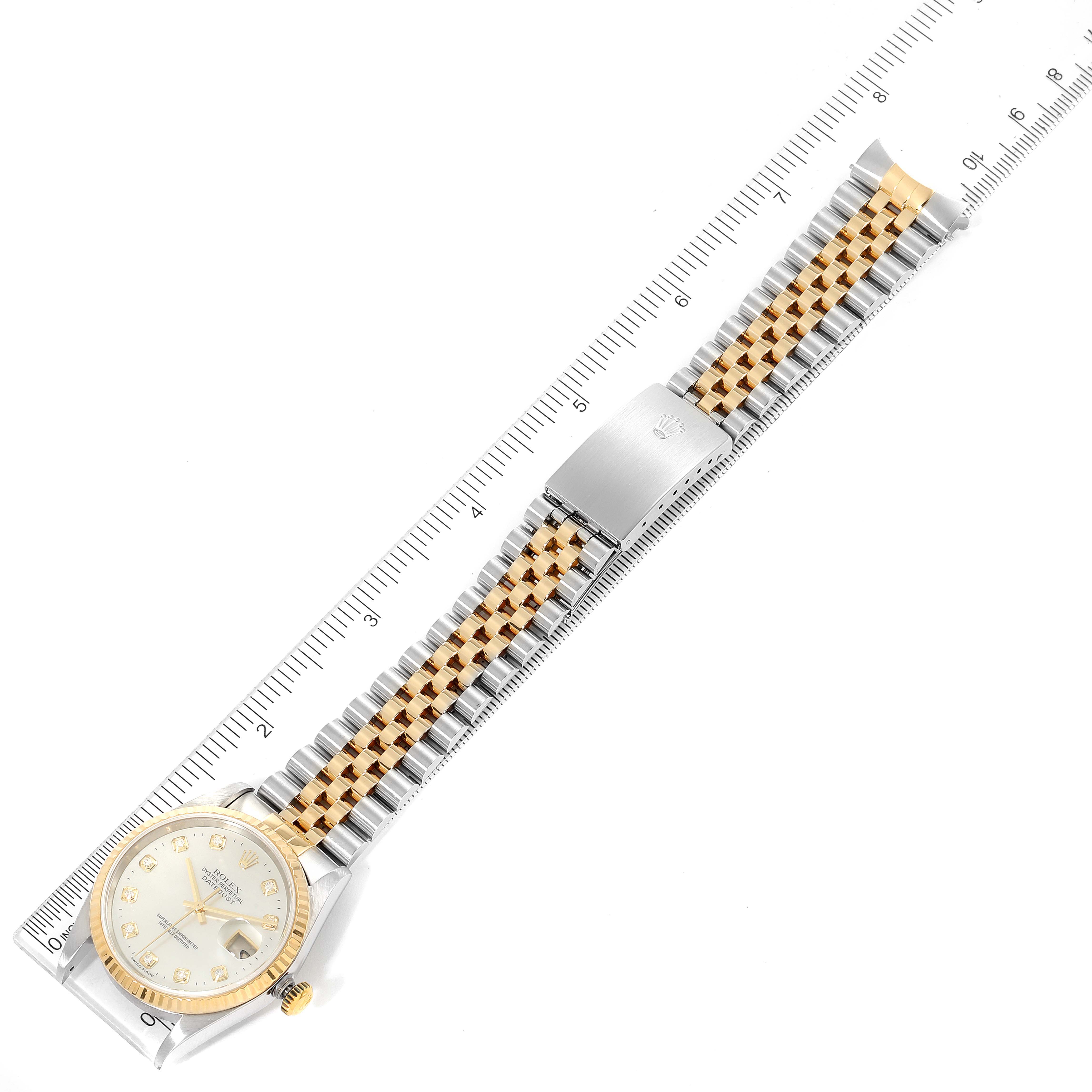 The image shows an overhead view of a Rolex Datejust 16233 Men's Steel and Gold (two tone) Mother of Pearl Dial 16233 Men's Steel and Gold (two tone) Mother of Pearl Dial watch, highlighting the face, bezel, and two-tone bracelet with a clasp.