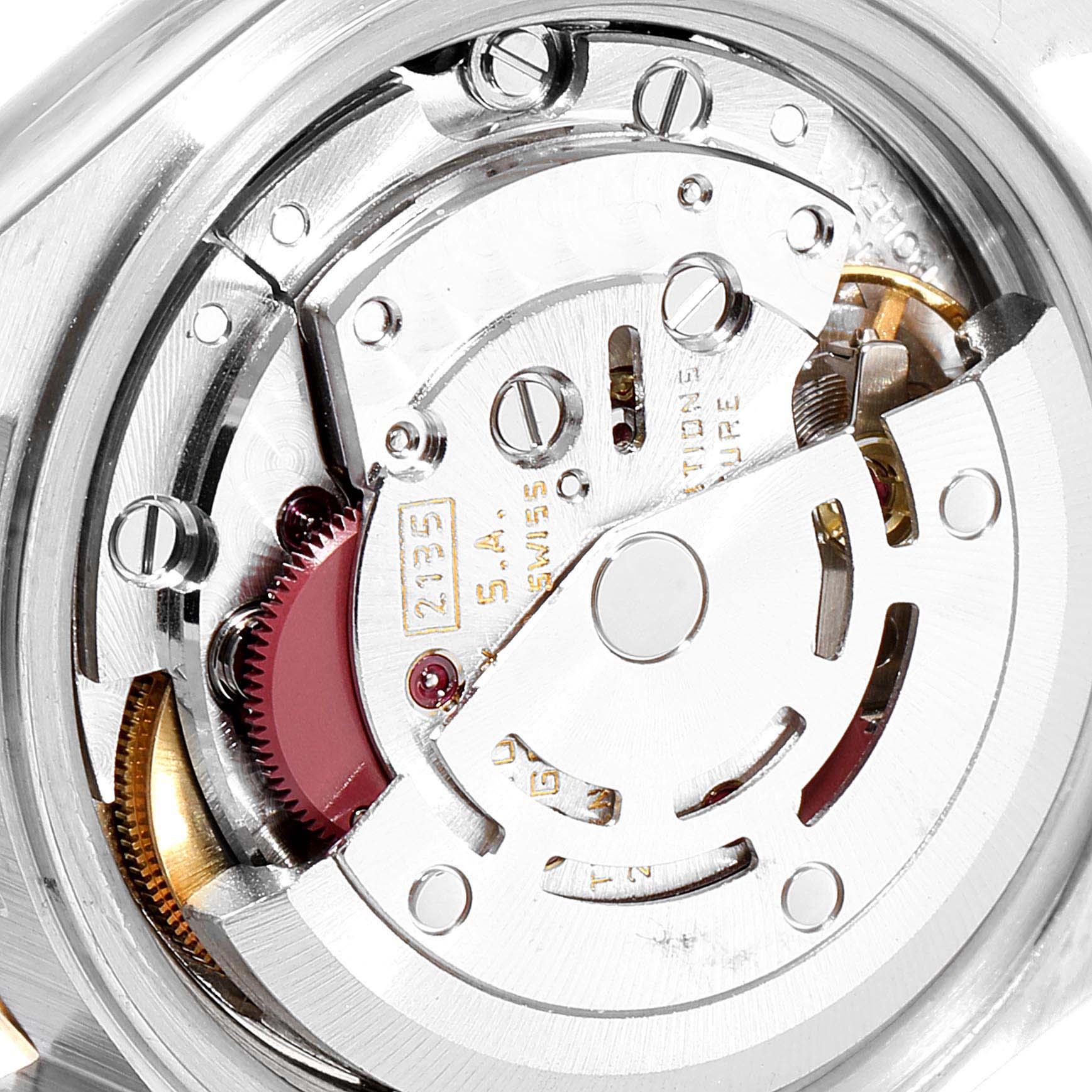 The image shows a close-up of the movement mechanism of a Rolex Datejust 69173 Women
s Steel and Gold (two tone) Silver Dial 69173 Women
s Steel and Gold (two tone) Silver Dial watch.