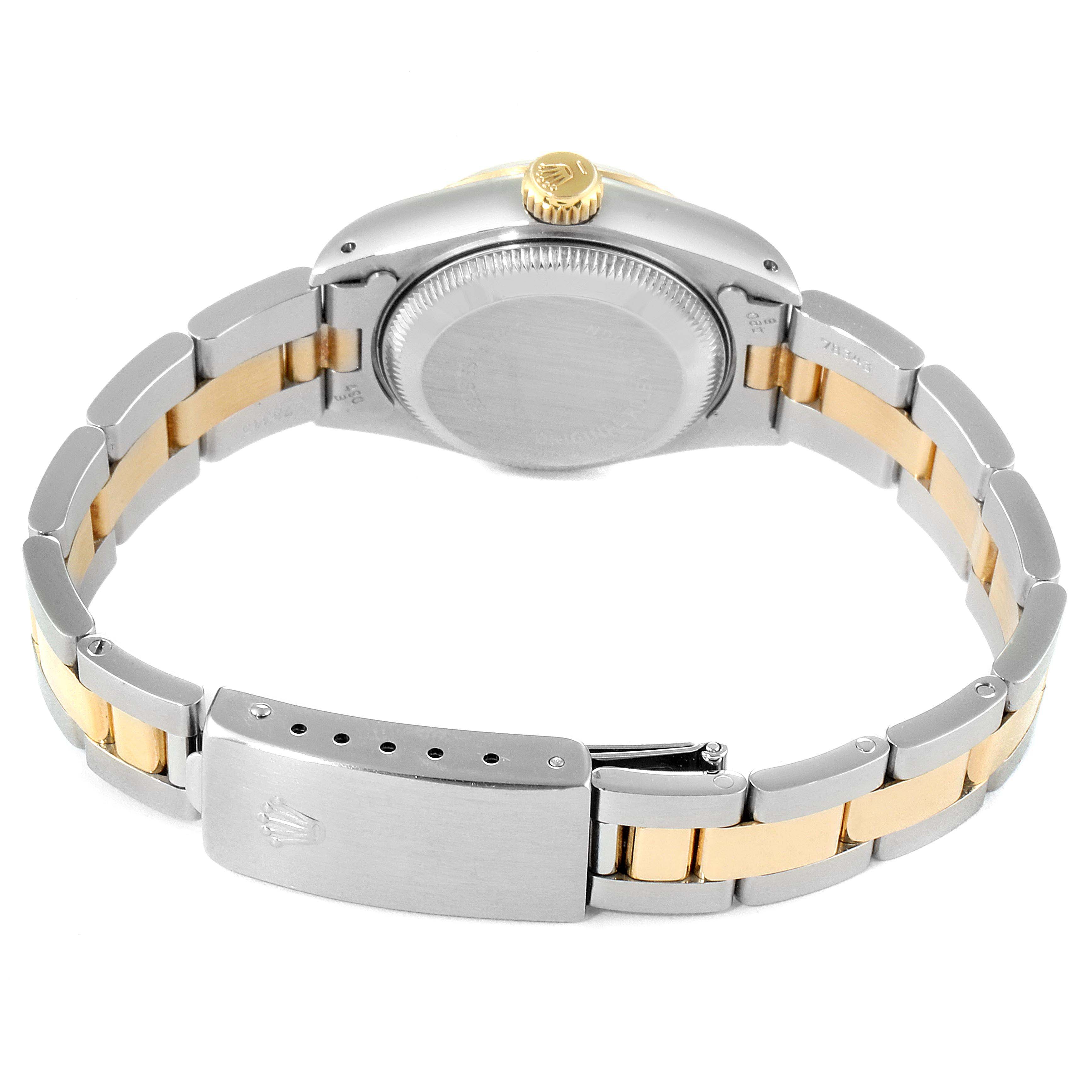 The image shows the back side of a Rolex Datejust 69173 Women
s Steel and Gold (two tone) Silver Dial 69173 Women
s Steel and Gold (two tone) Silver Dial model watch, including the clasp, the bracelet, and the case back.