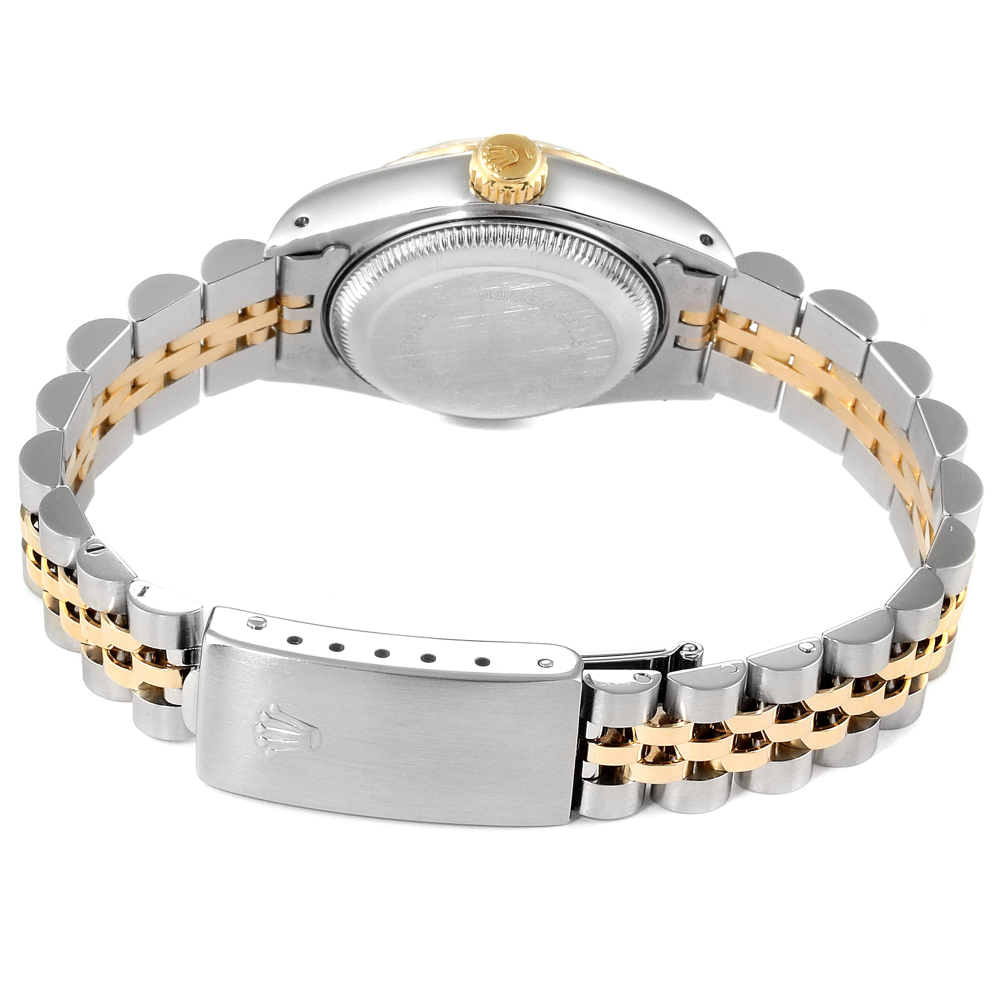 This image shows the Rolex Datejust 69173 Women
s Steel and Gold (two tone) White Dial 69173 Women
s Steel and Gold (two tone) White Dial watch from the back, highlighting the case back, crown, and two-tone bracelet with clasp.