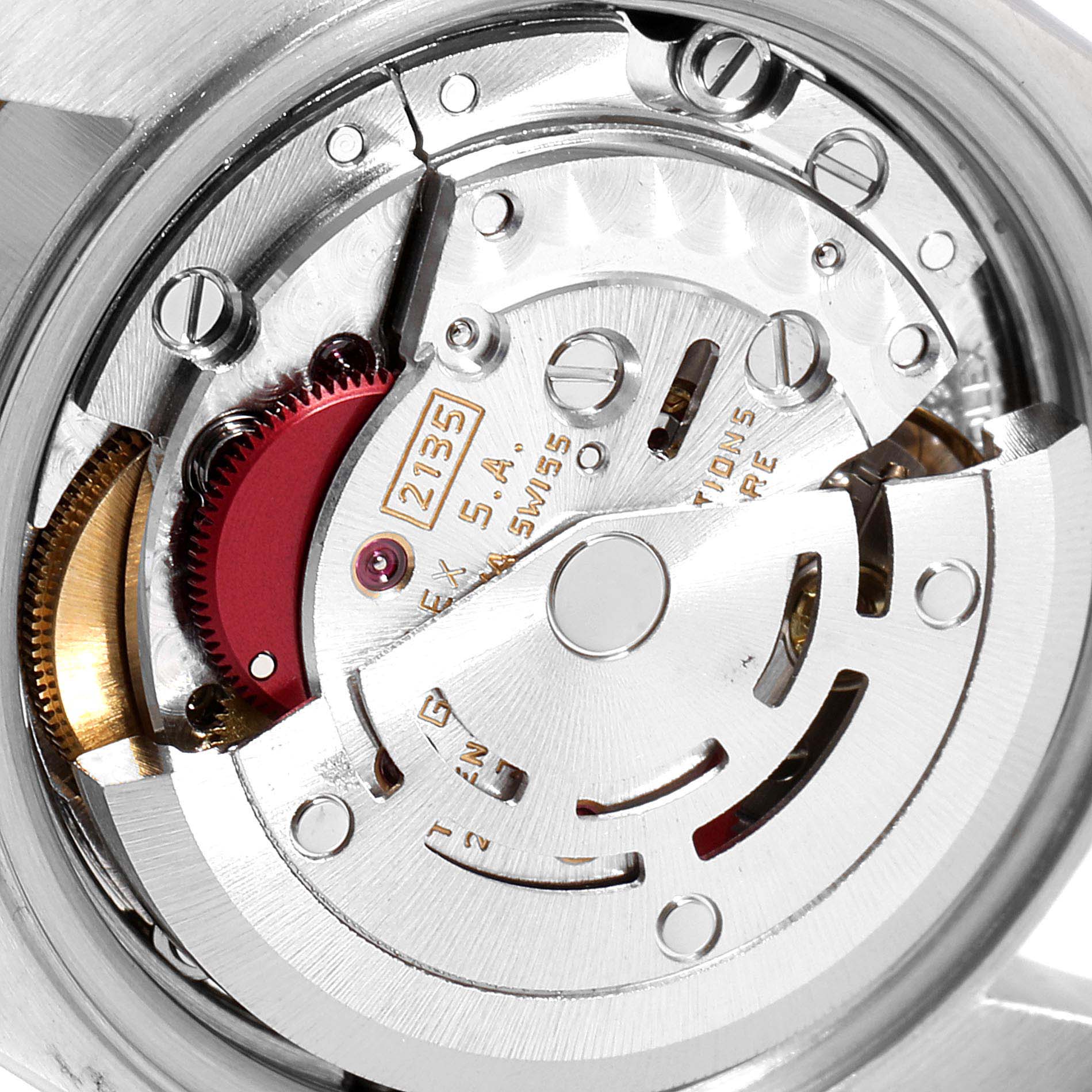 This image shows a close-up view of the movement mechanism of a Rolex Datejust 69173 Women
s Steel and Gold (two tone) White Dial 69173 Women
s Steel and Gold (two tone) White Dial watch.