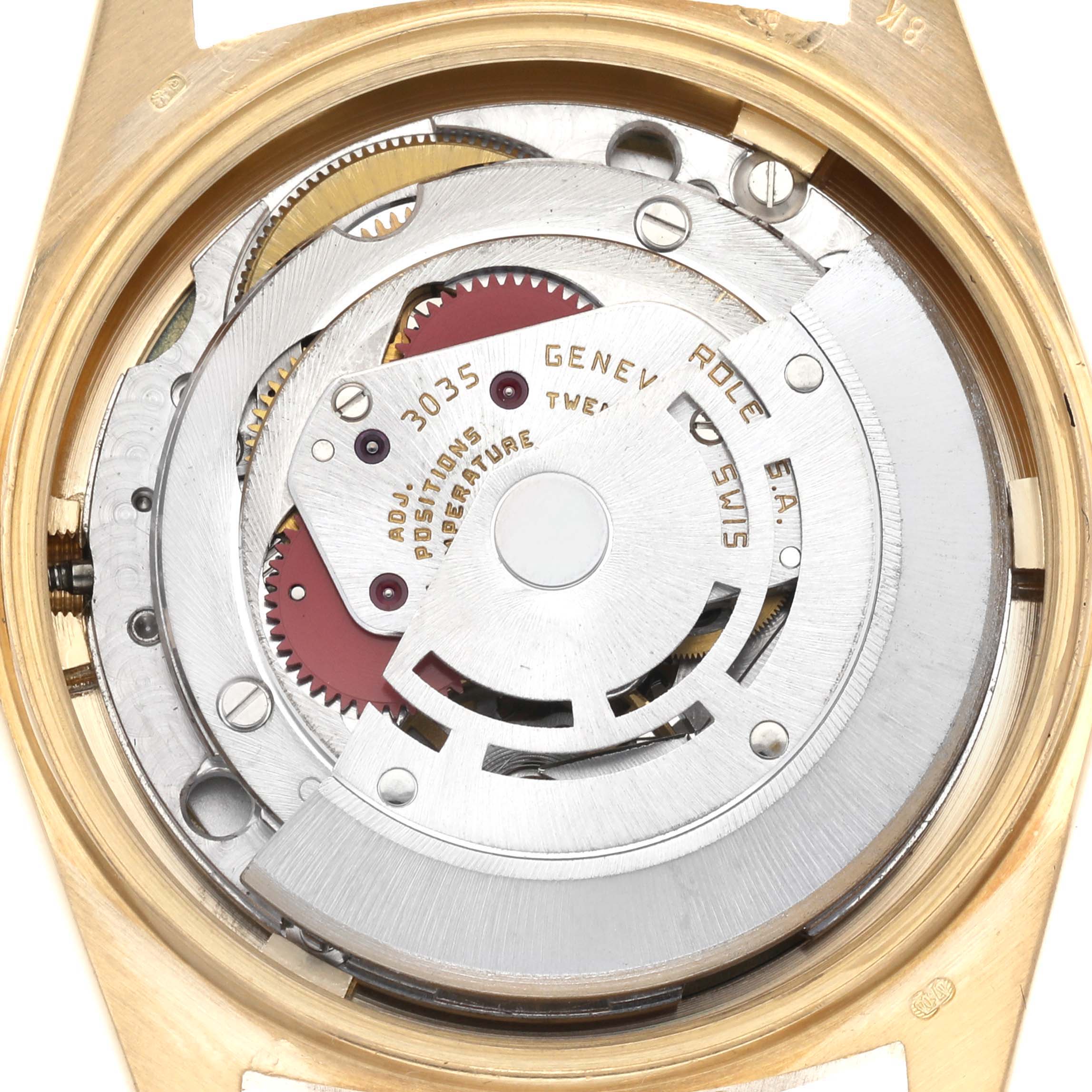 The image shows the back view of a Rolex Vintage Collection 16018 Men's Yellow Gold Blue Dial 16018 Men's Yellow Gold Blue Dial watch, highlighting the intricate movement components.