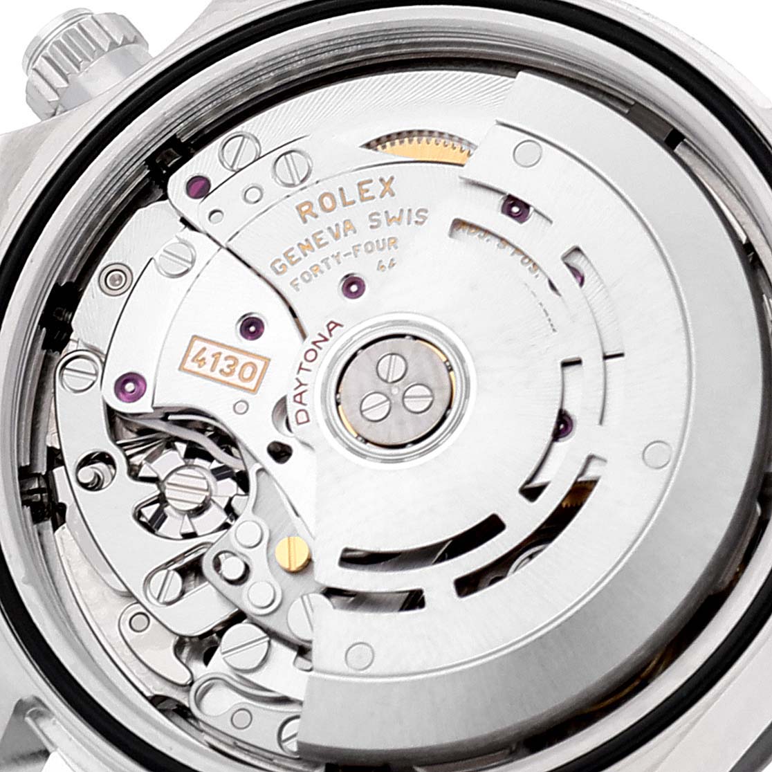 The image shows the internal mechanism of a Rolex Daytona 116500 Men's Stainless Steel Black Dial 116500 Men's Stainless Steel Black Dial watch from a close-up, angled view.