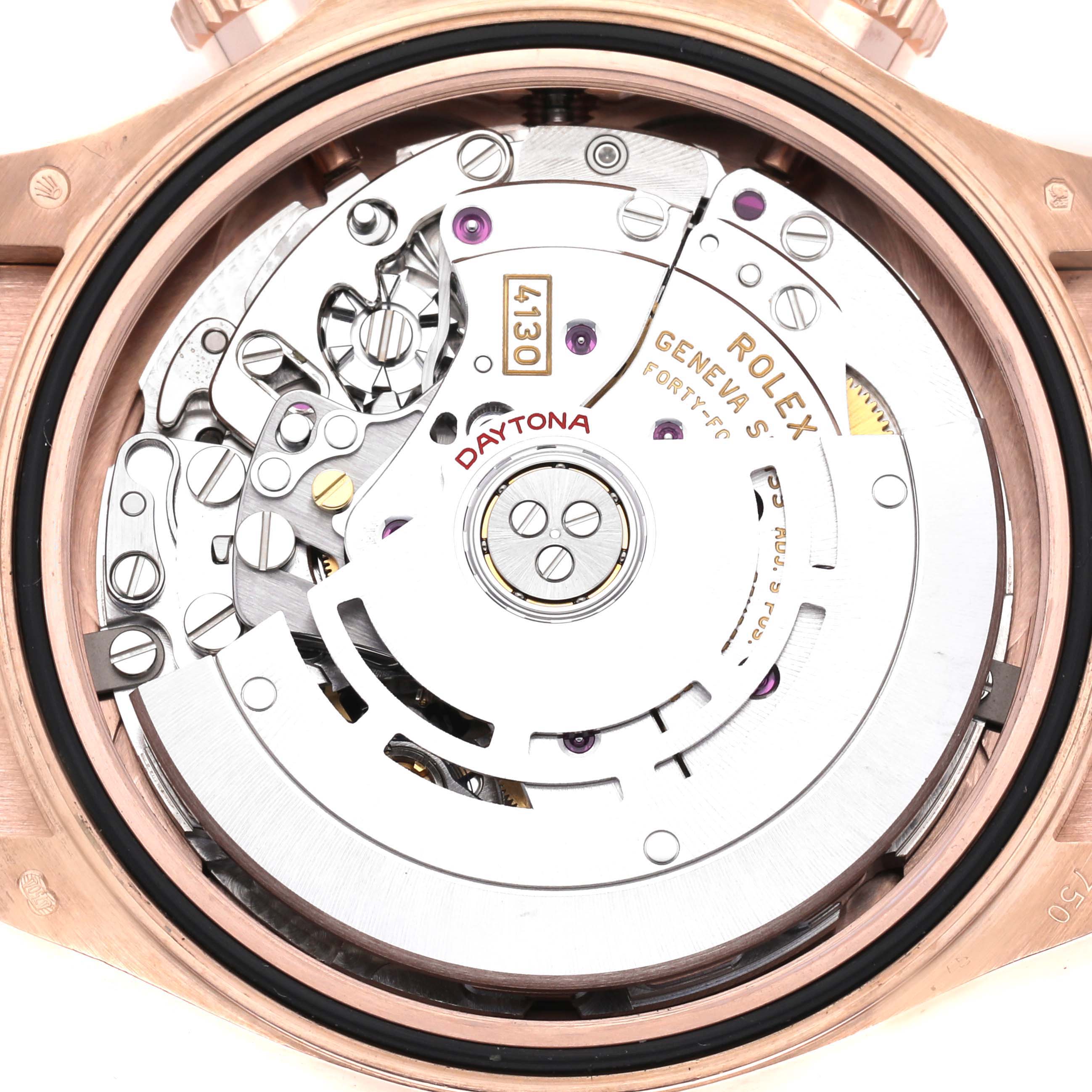 The image shows the internal mechanism of a Rolex Daytona 116515LN Men's Rose Gold Black Dial 116515LN Men's Rose Gold Black Dial watch from a back view angle, highlighting the movement components.