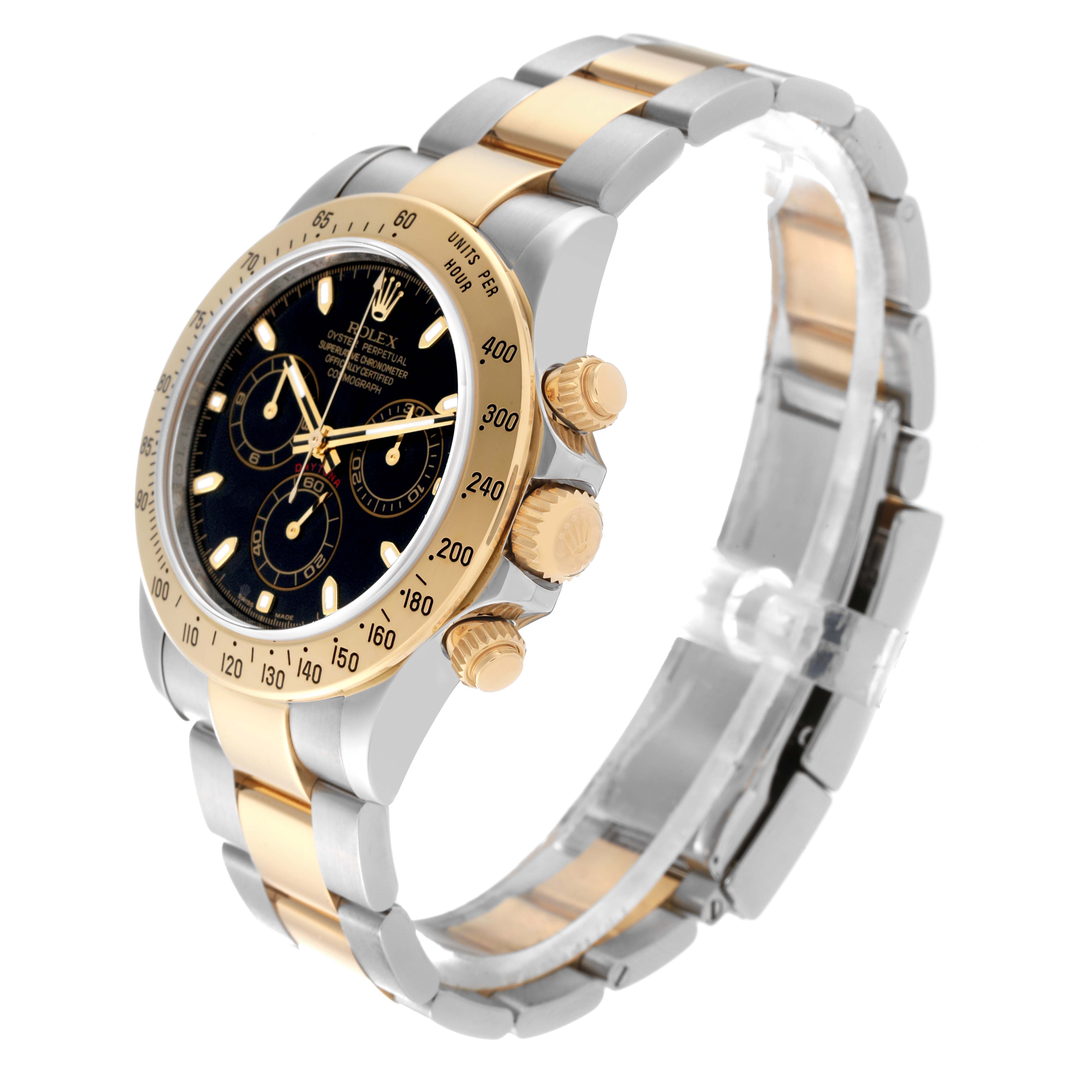 This image shows a Rolex Daytona 116523 Men
s Steel and Gold (two tone) Black Dial 116523 Men
s Steel and Gold (two tone) Black Dial model watch from a side angle, highlighting the face, bezel, crown, and bracelet.