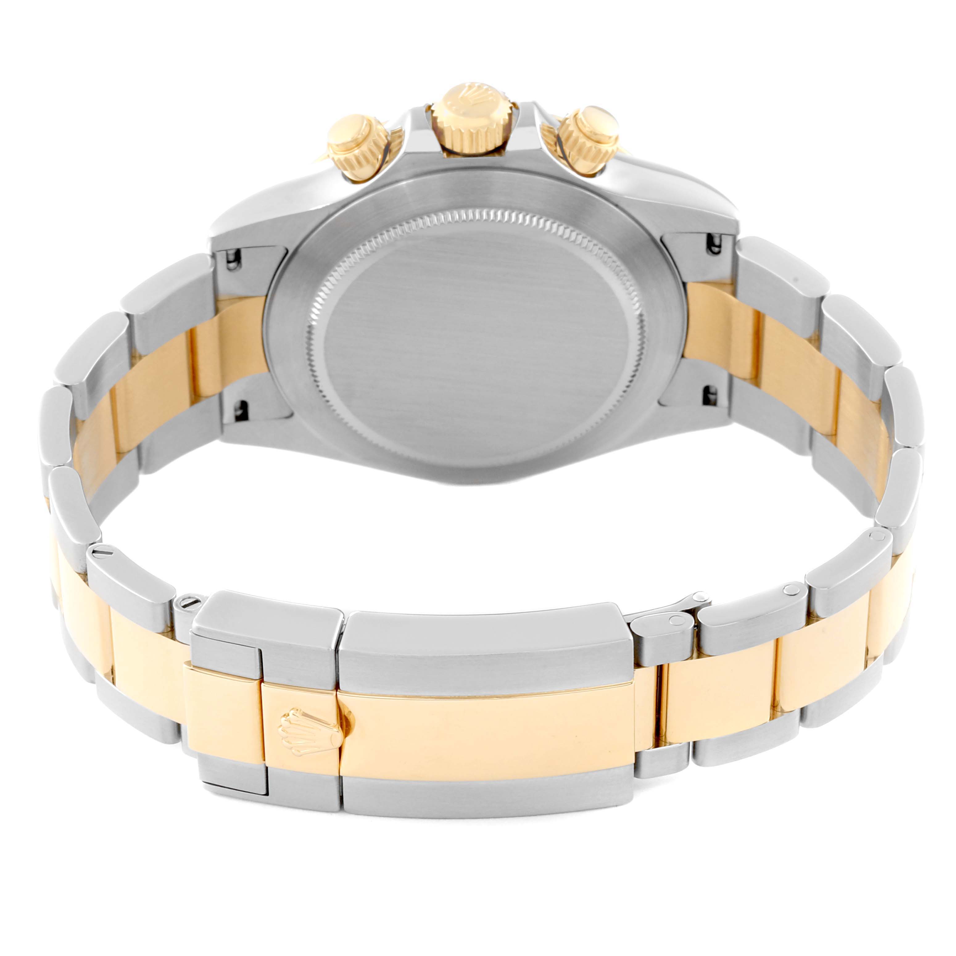 The image shows the back view of a Rolex Daytona 116523 Men
s Steel and Gold (two tone) Black Dial 116523 Men
s Steel and Gold (two tone) Black Dial watch, highlighting the metal bracelet and clasp.