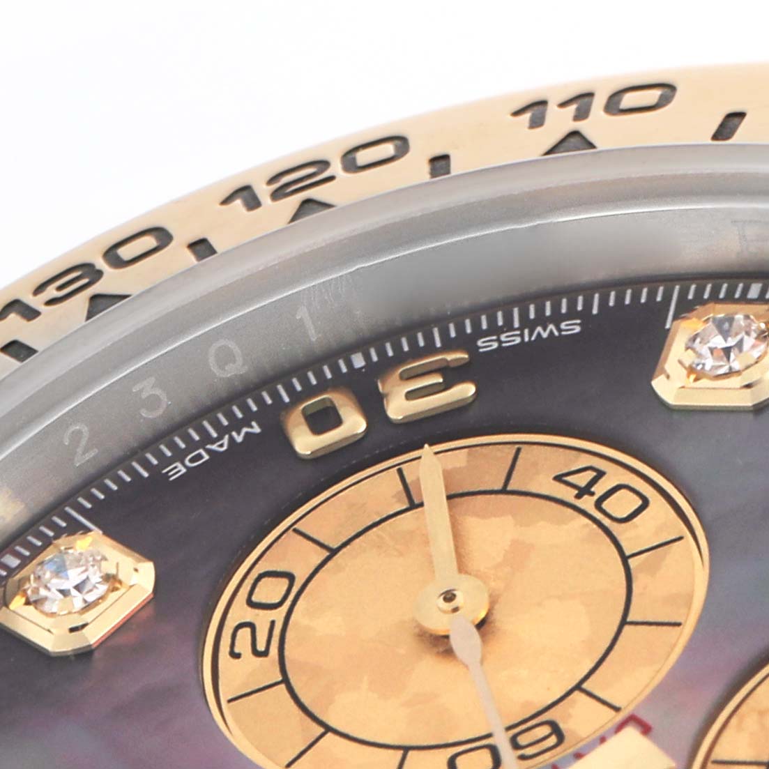 The image shows a close-up of the Rolex Daytona 116503 Men's Steel and Gold (two tone) Mother of Pearl Dial 116503 Men's Steel and Gold (two tone) Mother of Pearl Dial dial and bezel, focusing on the 30-minute sub-dial and tachymetric scale.
