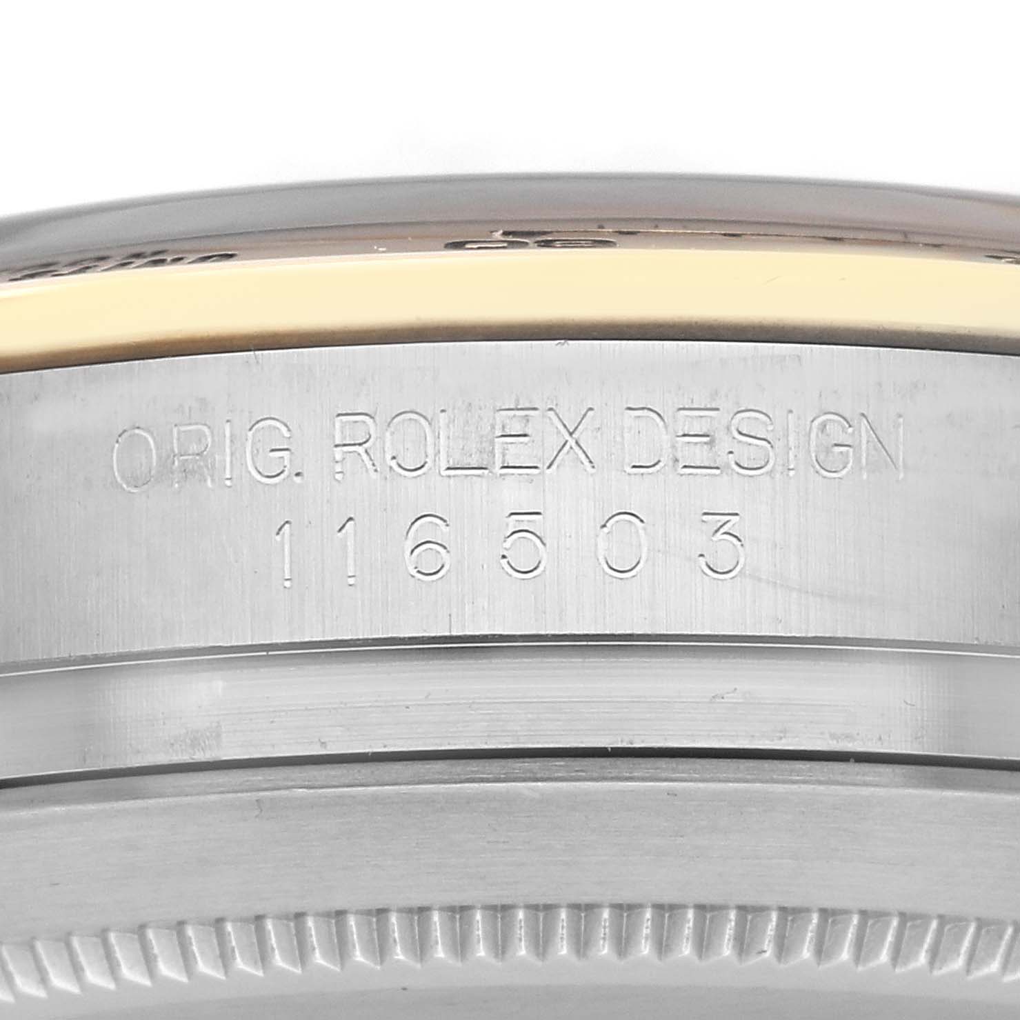 The image shows a close-up of the side of a Rolex Daytona 116503 Men's Steel and Gold (two tone) Mother of Pearl Dial 116503 Men's Steel and Gold (two tone) Mother of Pearl Dial watch, highlighting the engraved model number and design details.