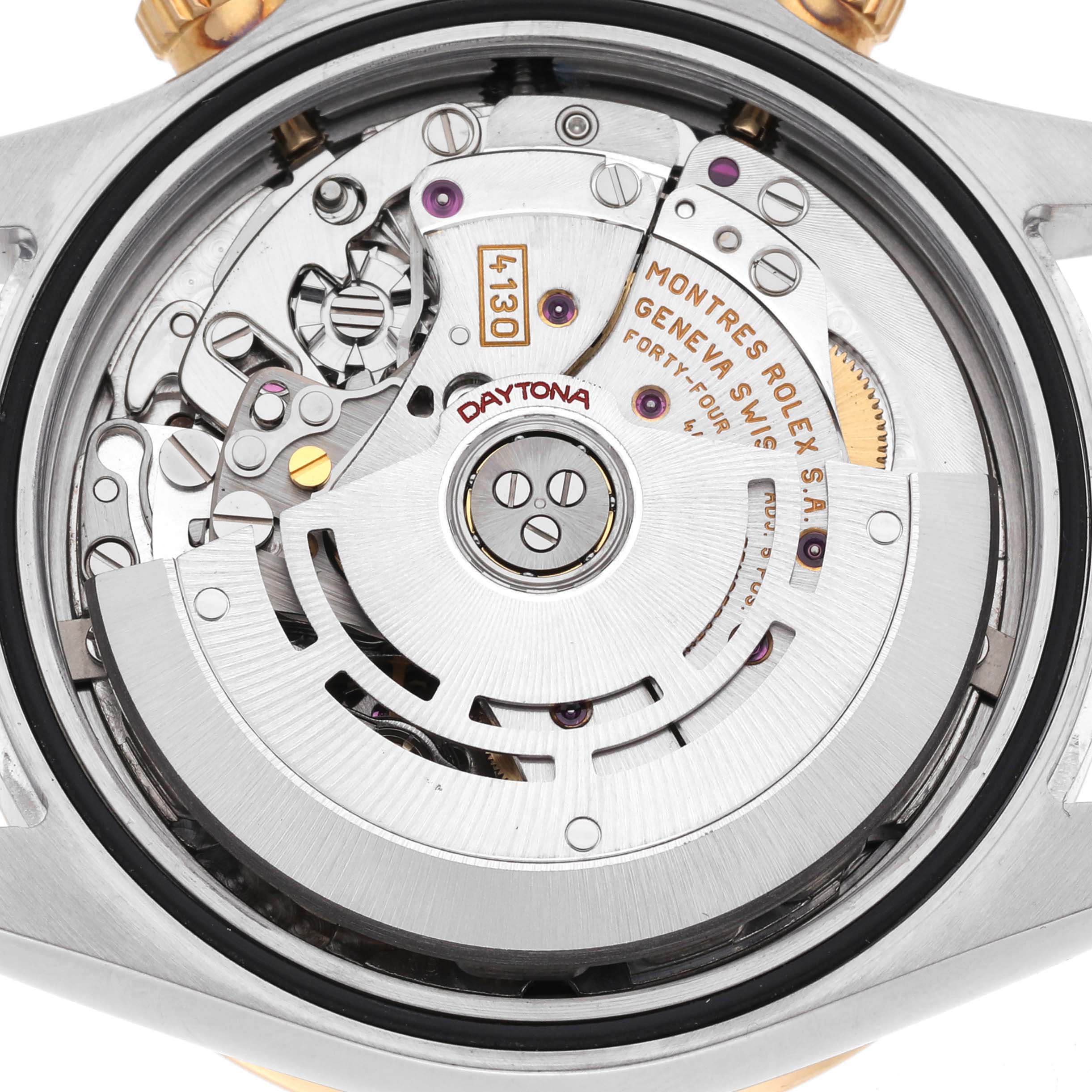 The image shows the internal movement of a Rolex Daytona 116523 Men's Steel and Gold (two tone) Silver Dial 116523 Men's Steel and Gold (two tone) Silver Dial, viewed from the back, highlighting the rotor and intricate components.