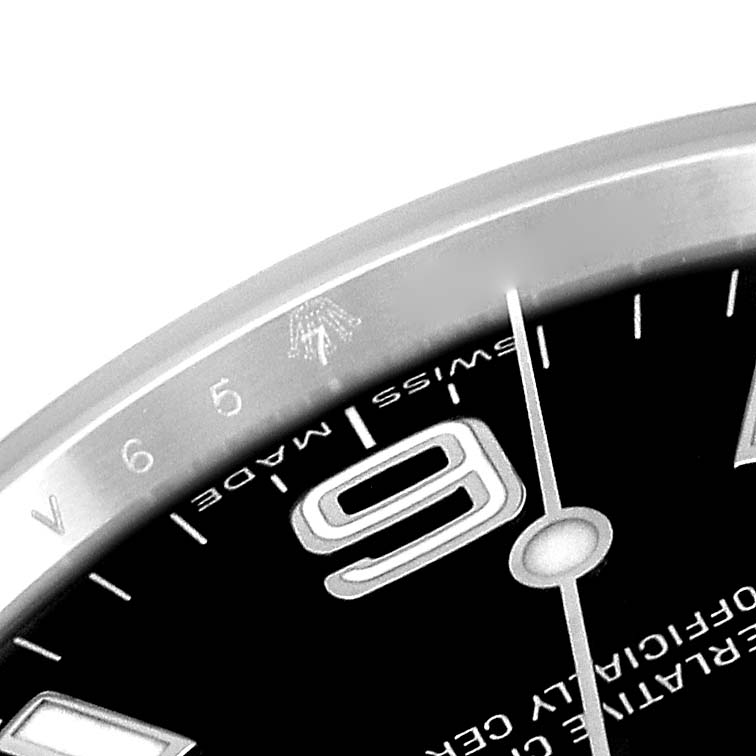 The image shows a close-up of the dial and bezel of a Rolex Explorer 114270 Men
s Stainless Steel Black Dial 114270 Men
s Stainless Steel Black Dial watch, highlighting the "6" marker and "Swiss Made" text.