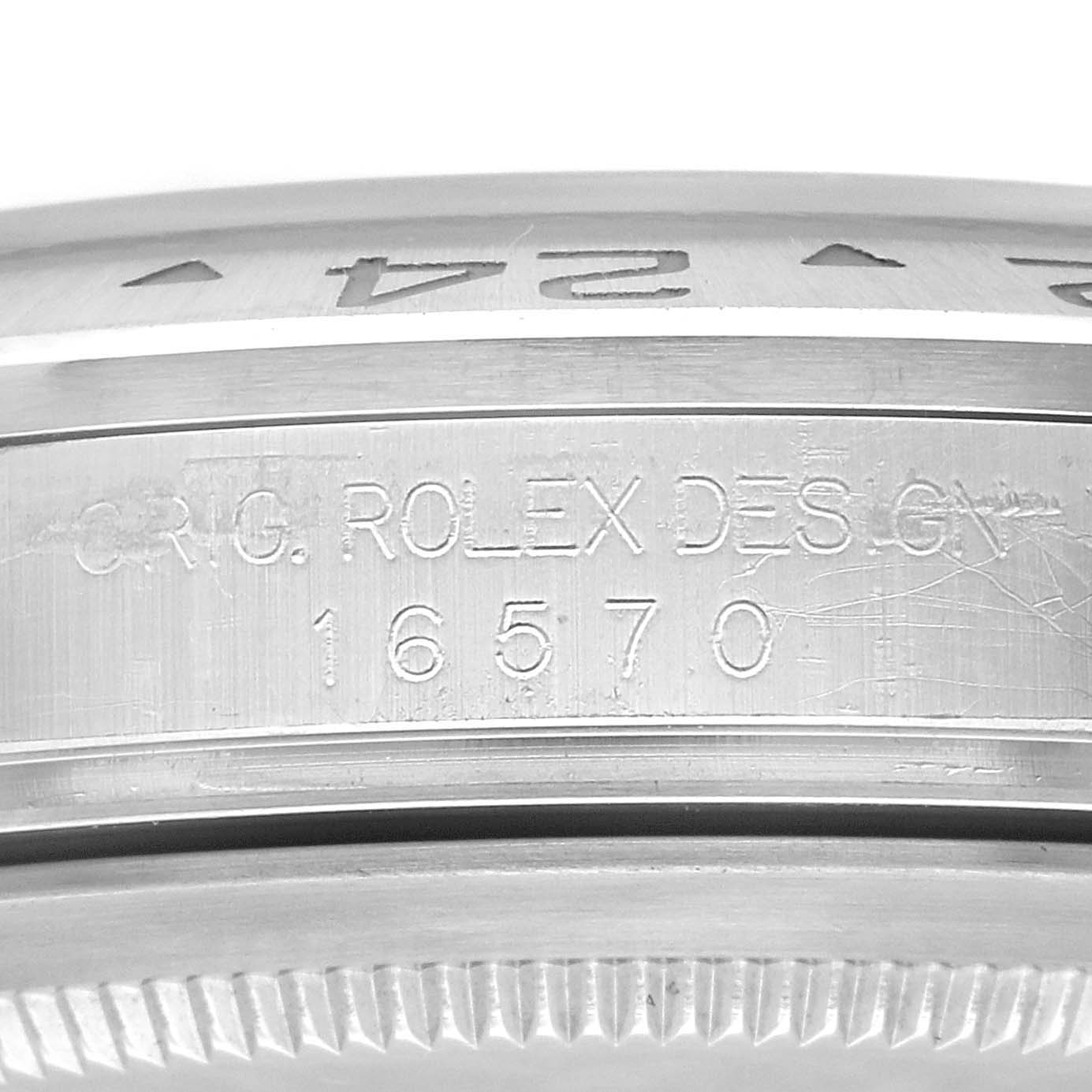 The image shows a close-up view of the engraved serial number and model details on the side of the Rolex Explorer 16570 Men's Stainless Steel White Dial 16570 Men's Stainless Steel White Dial watch.