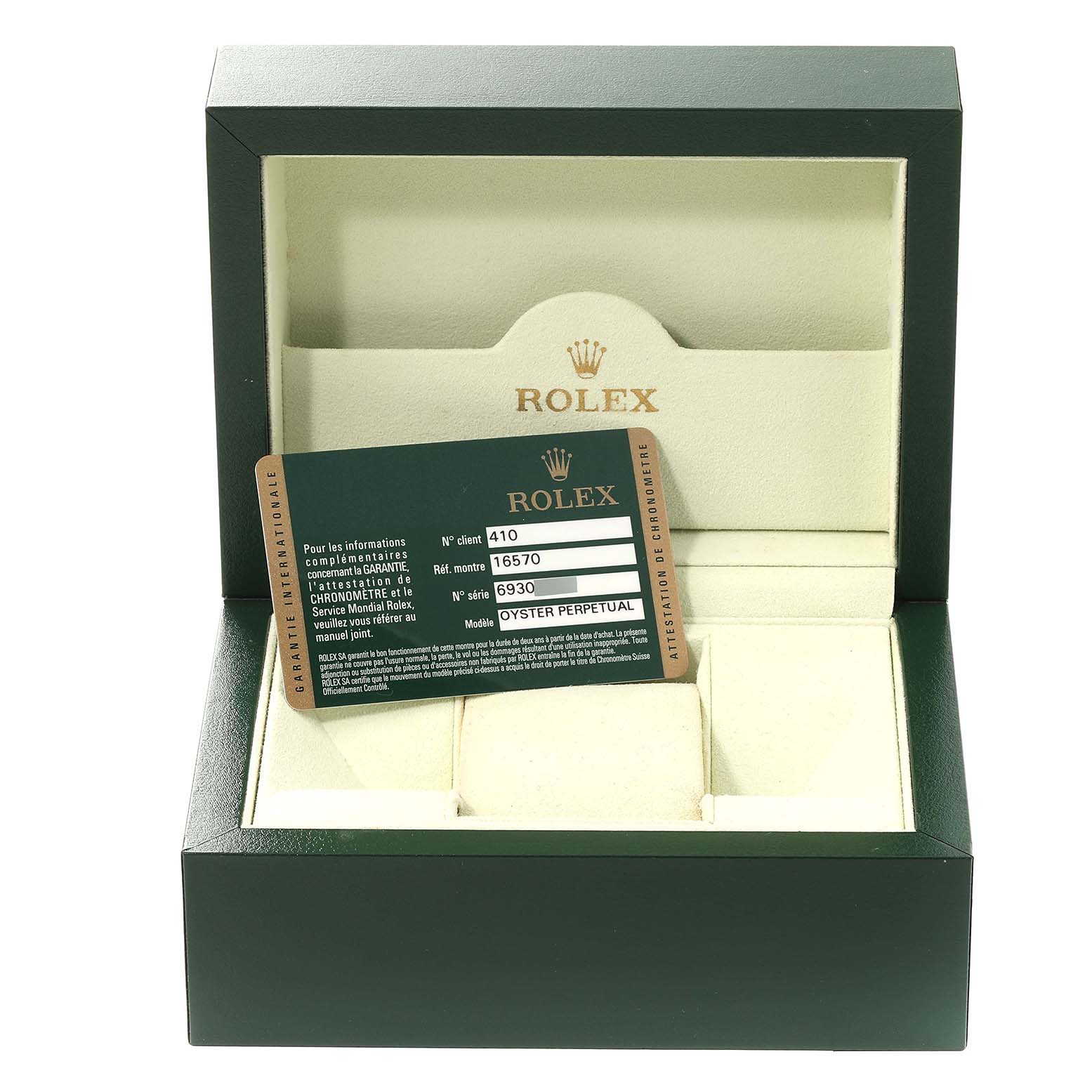 The image shows the open box and warranty card for a Rolex Explorer 16570 Men's Stainless Steel White Dial 16570 Men's Stainless Steel White Dial model.
