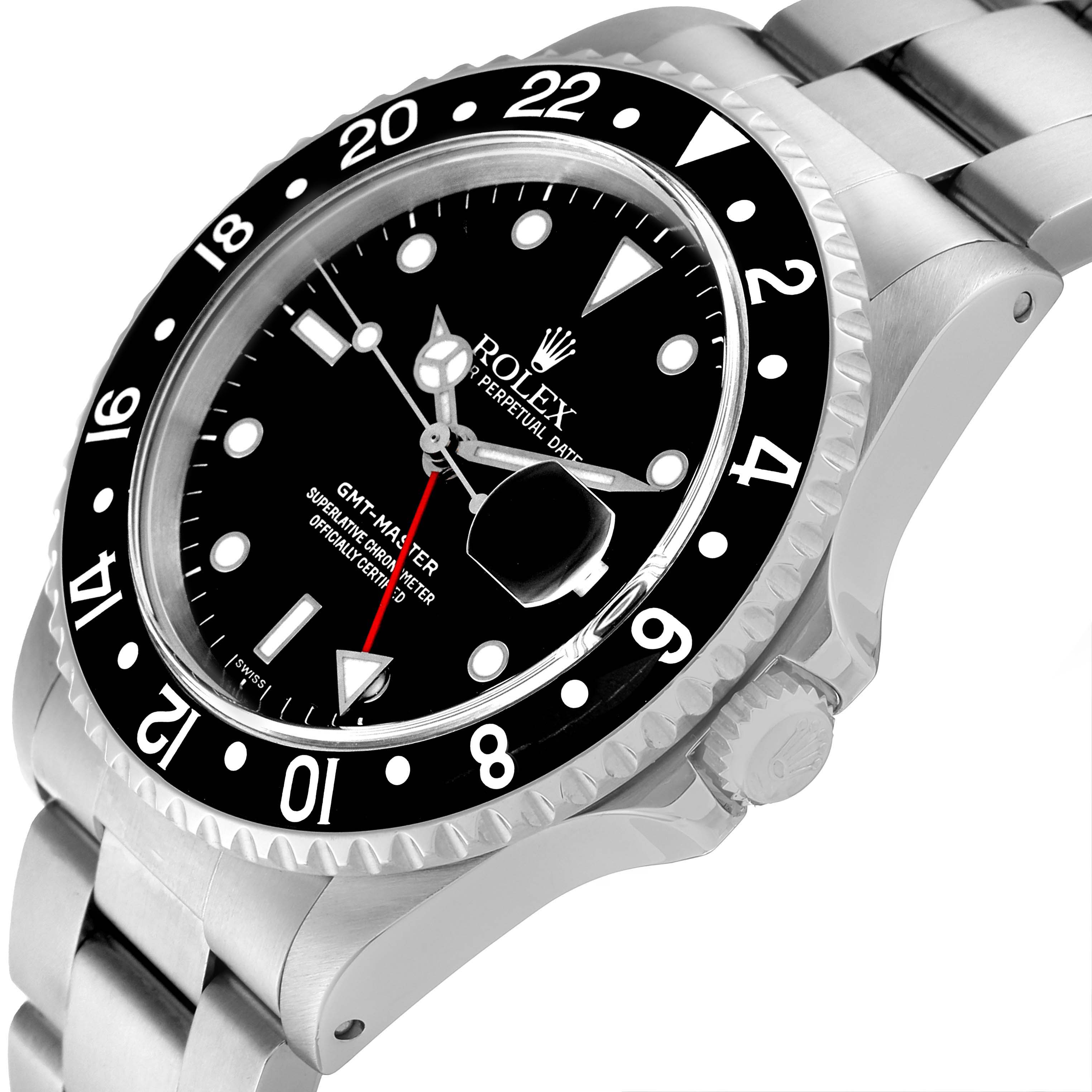 This image shows a Rolex GMT-Master 16700 Men's Stainless Steel Black Dial 16700 Men's Stainless Steel Black Dial watch at an angle highlighting the dial, bezel, and part of the bracelet.