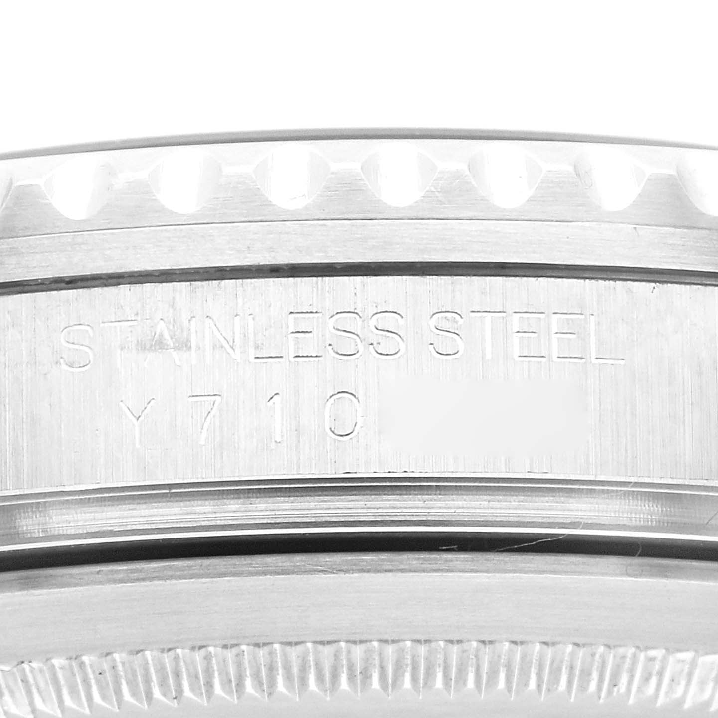 This close-up angle shows the engraved stainless steel side of a Rolex GMT-Master 16710 Men
s Stainless Steel Black Dial 16710 Men
s Stainless Steel Black Dial watch case.
