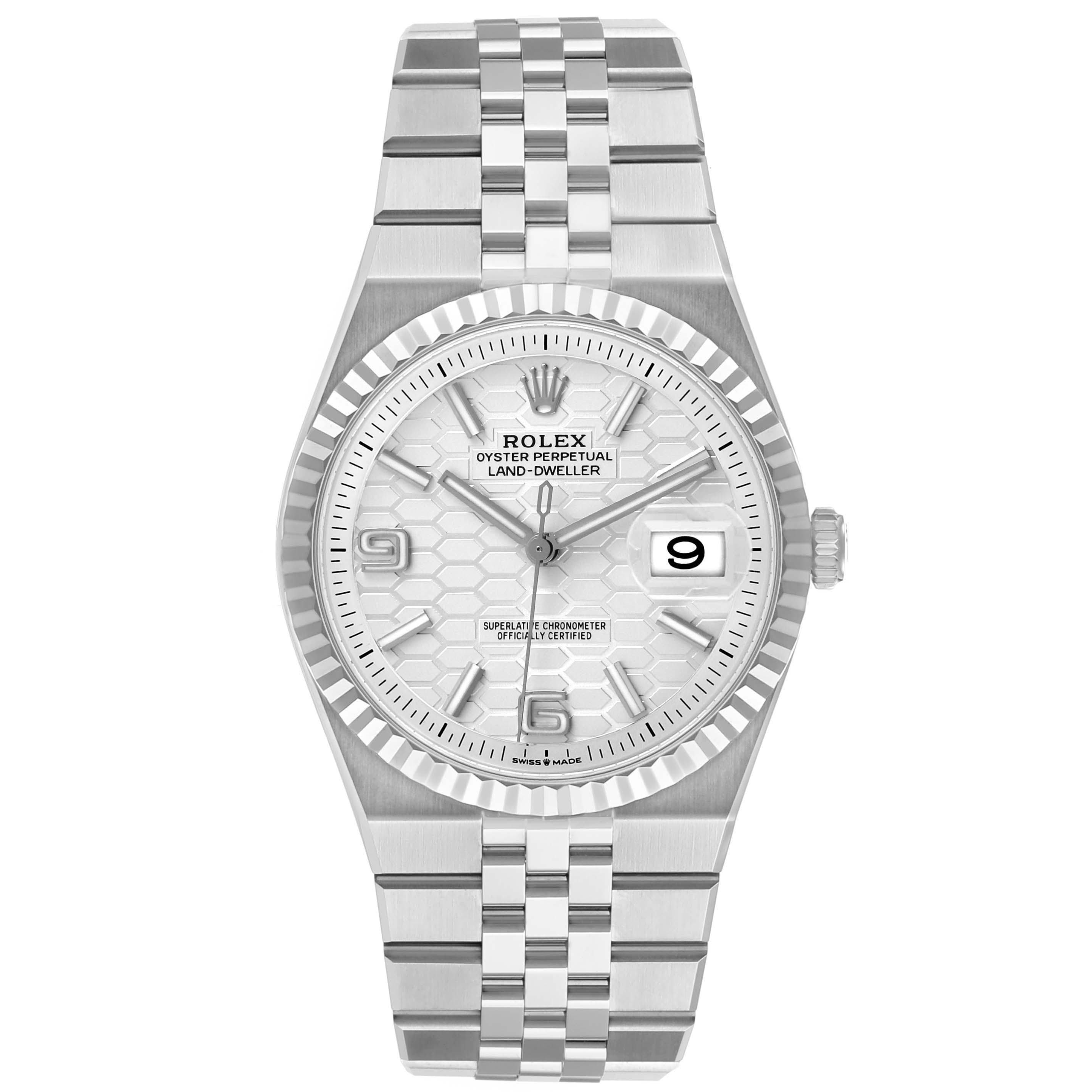 The Rolex Land-Dweller model is shown from a front view, displaying its face, bezel, and bracelet.