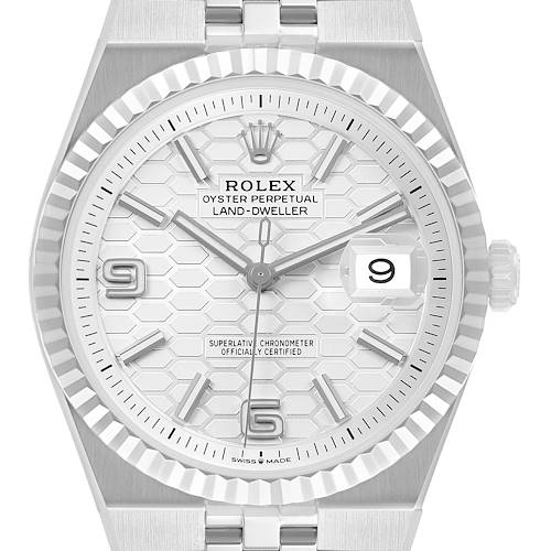The watch is shown from a top-down angle, highlighting the dial, bezel, and crown of the Rolex Land‑Dweller 127334 Men's Stainless Steel White Dial model.