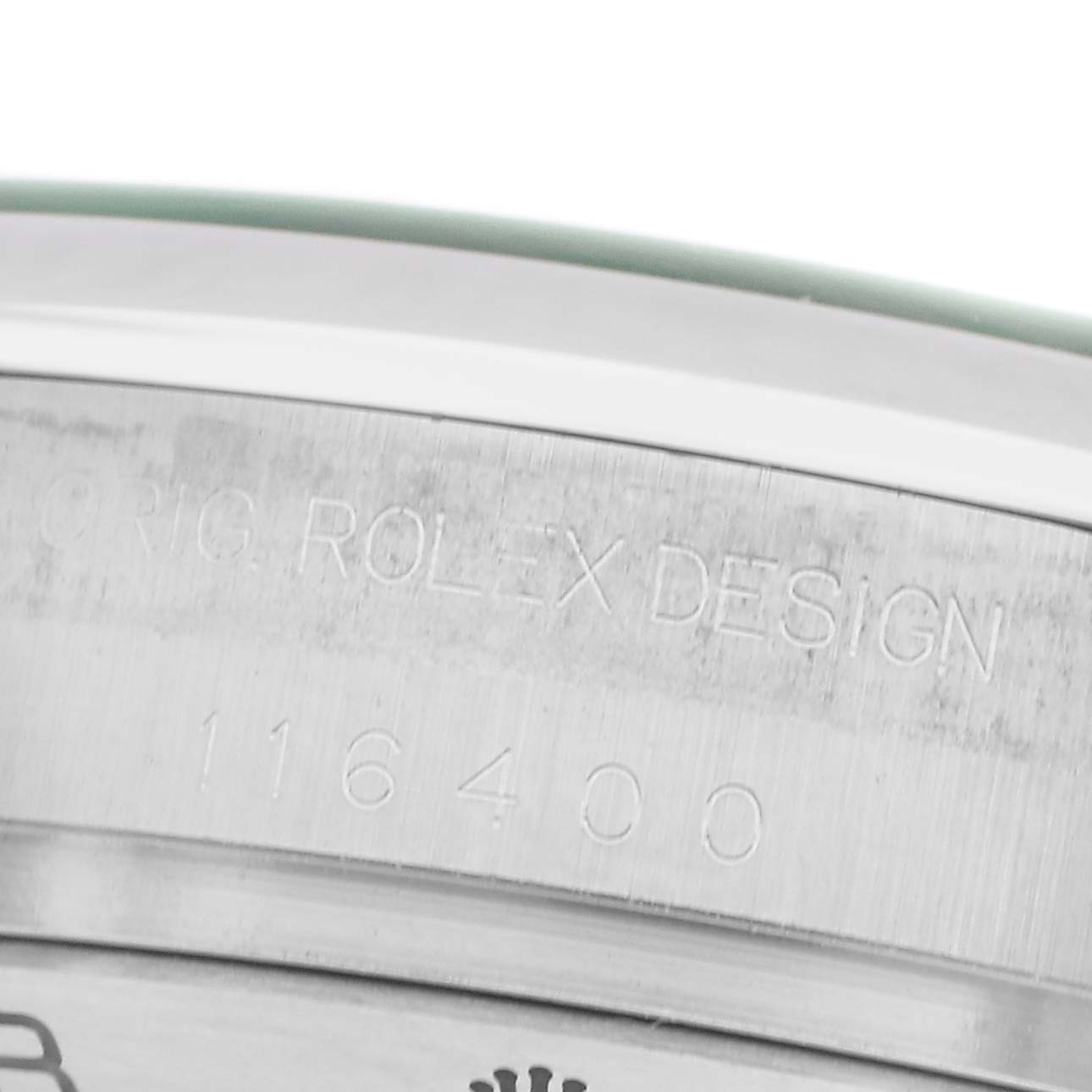 The image shows a close-up of the Rolex Milgauss 116400GV Men's Stainless Steel Blue Dial 116400GV Men's Stainless Steel Blue Dial model's case back, featuring engraving details.