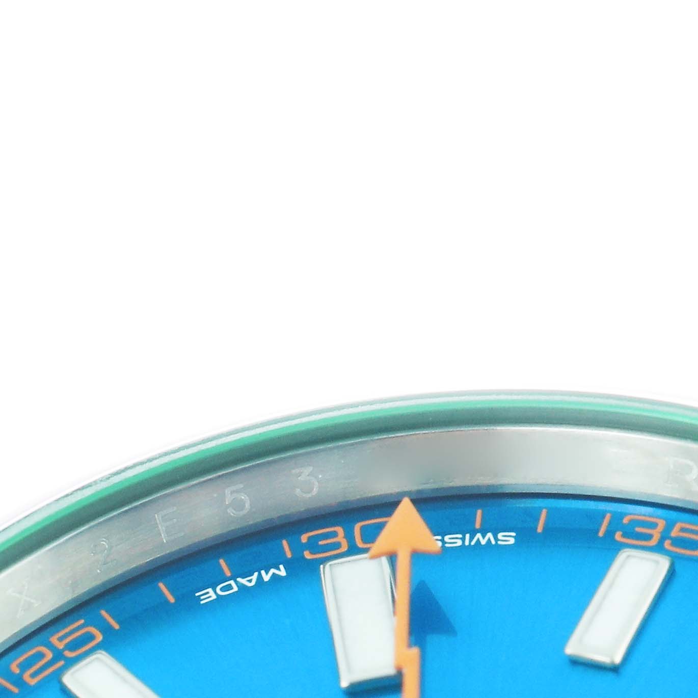The image shows a partial close-up of the Rolex Milgauss 116400GV Men's Stainless Steel Blue Dial 116400GV Men's Stainless Steel Blue Dial watch face, highlighting the blue dial, orange minute hand, and hour markers.
