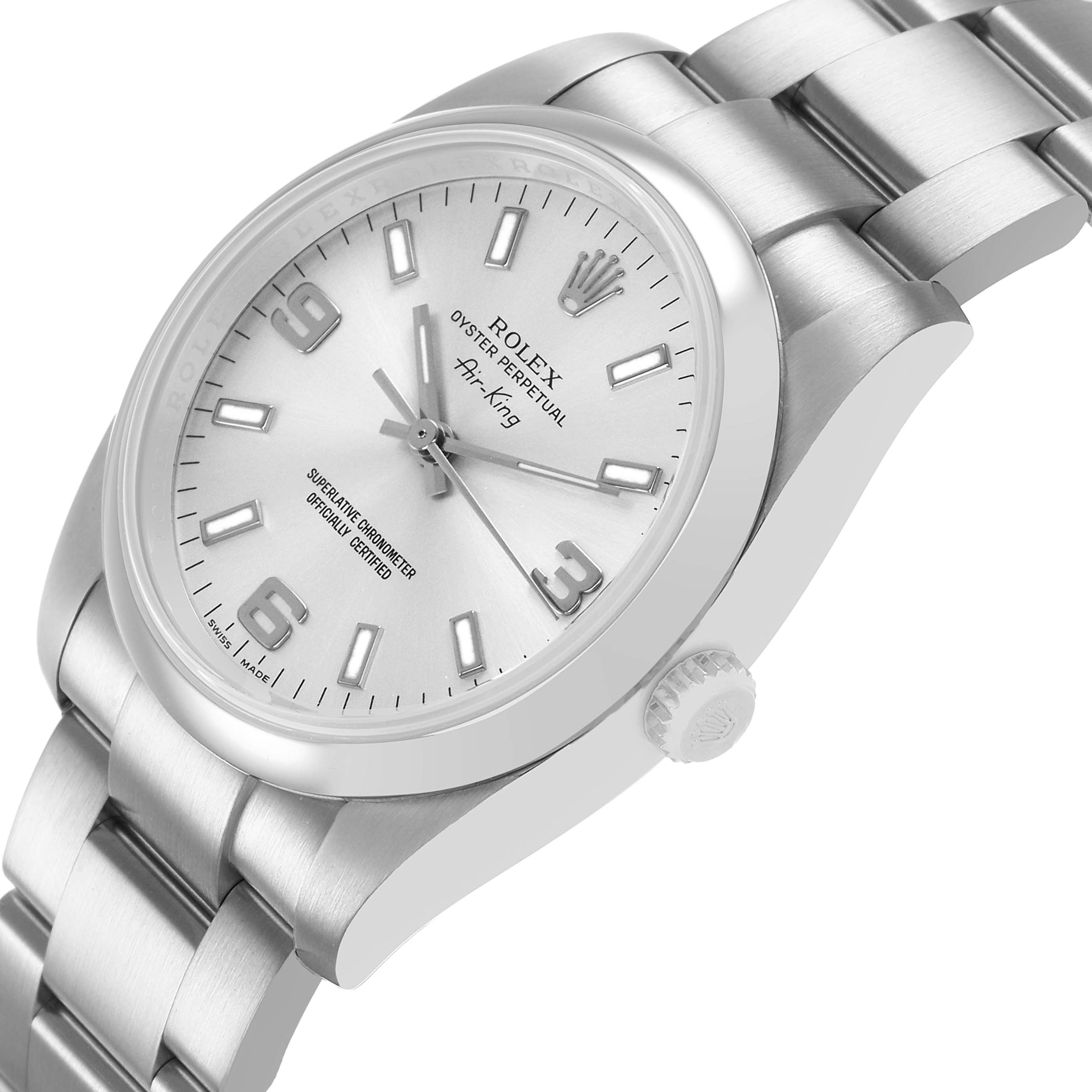The Rolex Air-King 114200 Men's Stainless Steel Silver Dial watch is shown at a three-quarter angle, highlighting the dial, bezel, and part of the bracelet.
