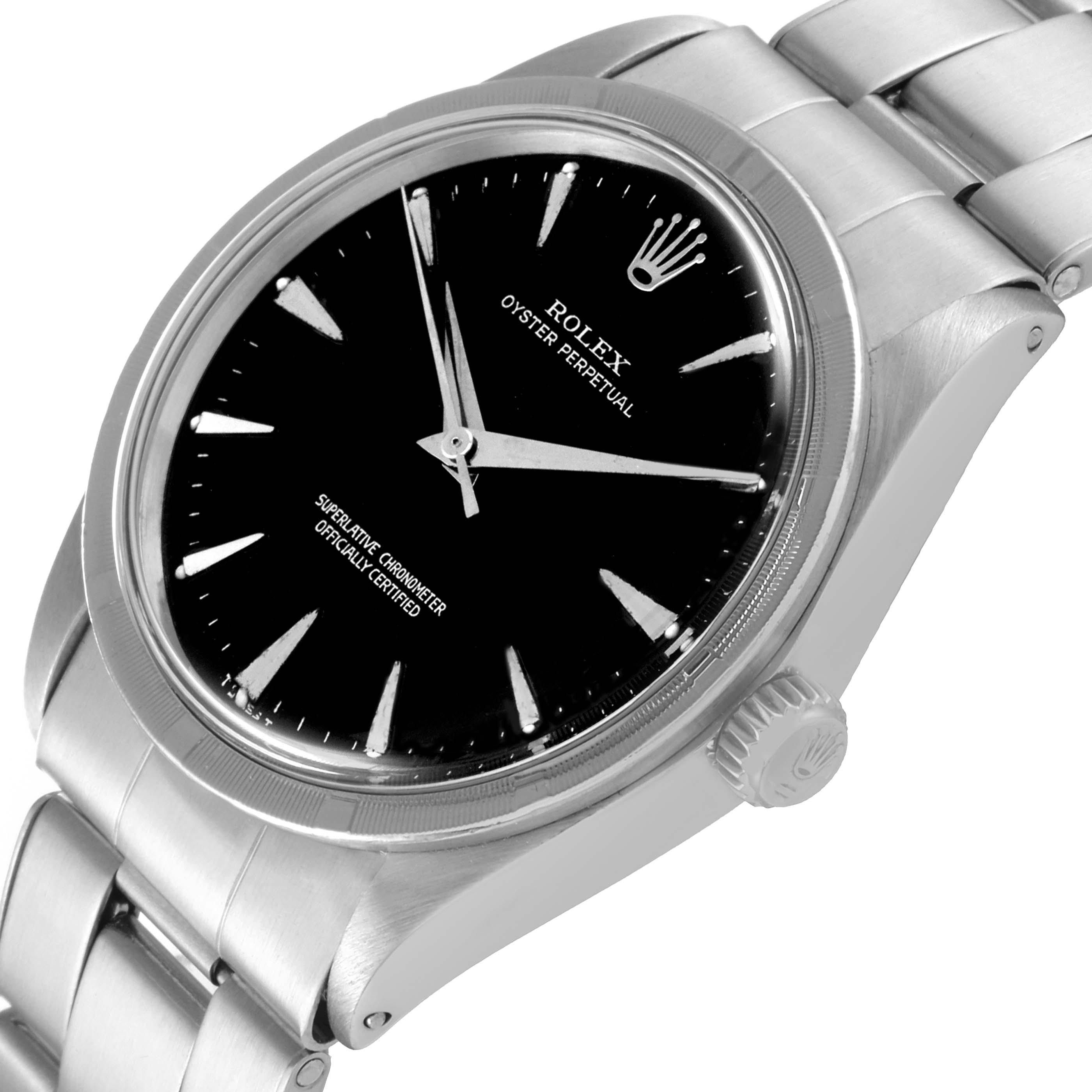 The image shows a close-up, angled view of the Rolex Vintage Collection 1007 Men's Stainless Steel Black Dial 1007 Men's Stainless Steel Black Dial model, featuring the dial, bezel, crown, and part of the bracelet.