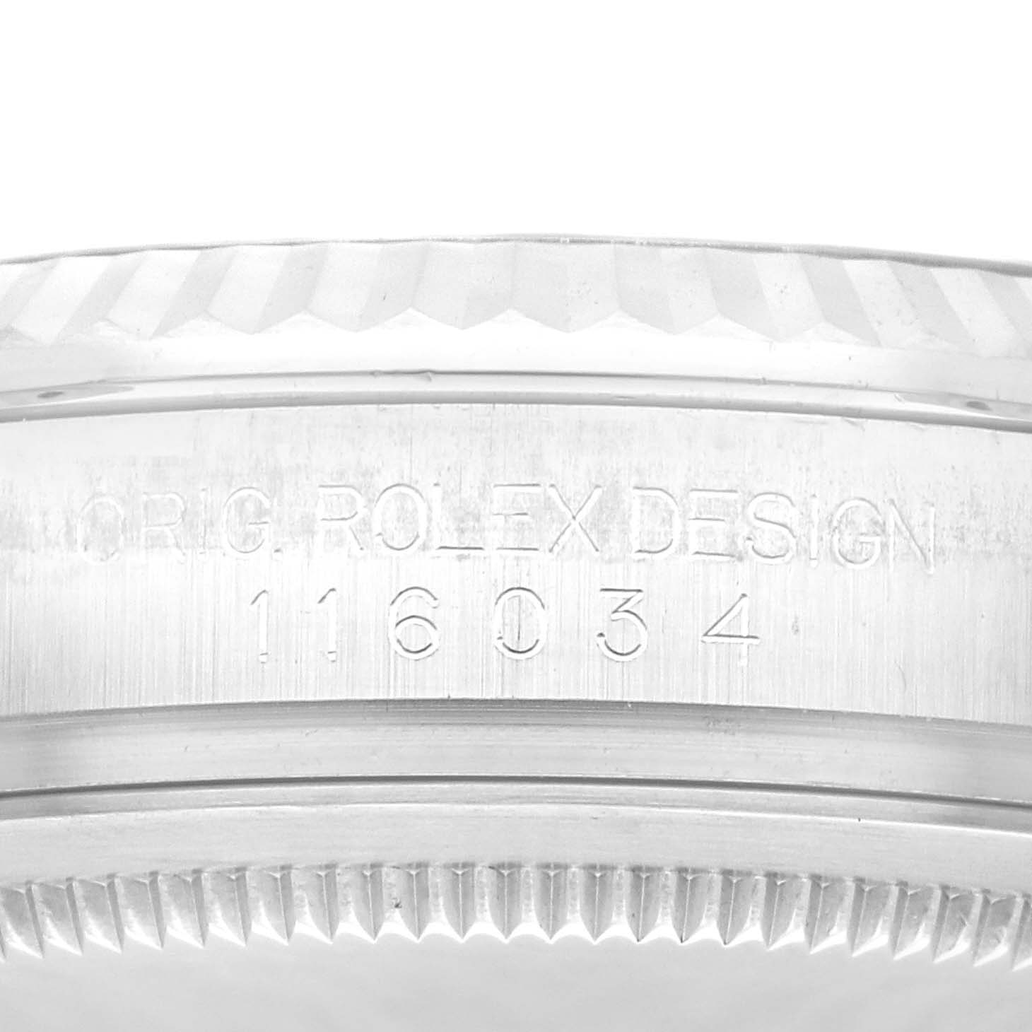 This image shows a close-up of the case side with the model number engraving of a Rolex Oyster Perpetual 116034 Men
s Stainless Steel Black Dial 116034 Men
s Stainless Steel Black Dial.