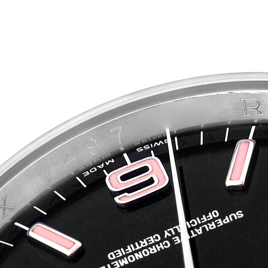 The image shows a close-up of the Rolex Oyster Perpetual 116034 Men
s Stainless Steel Black Dial 116034 Men
s Stainless Steel Black Dial watch, focusing on the bezel, part of the dial, and the "9" marker.