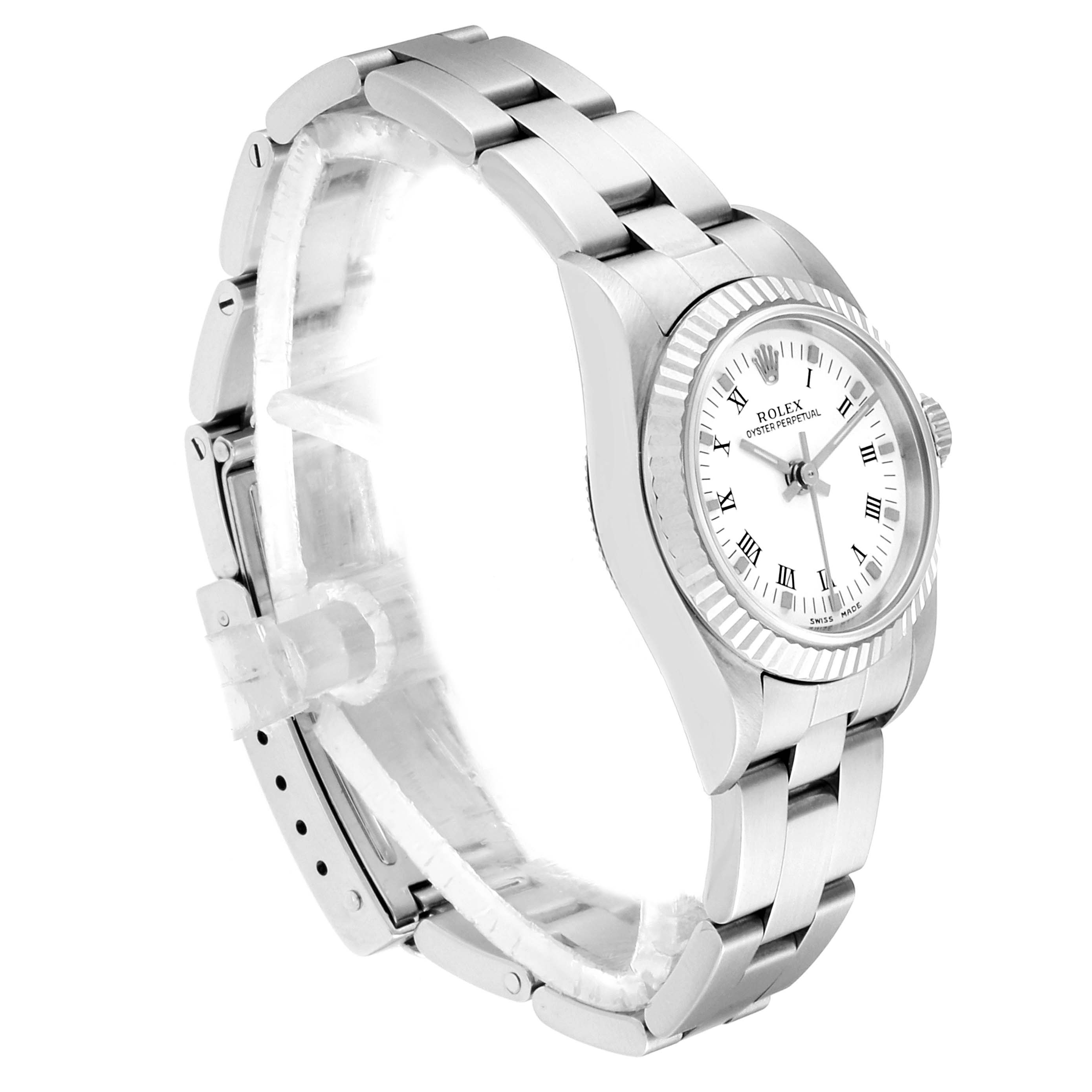 The Rolex Oyster Perpetual 76094 Women
s Stainless Steel White Dial 76094 Women
s Stainless Steel White Dial watch is shown at an angle highlighting the bracelet, bezel, and dial with Roman numerals.