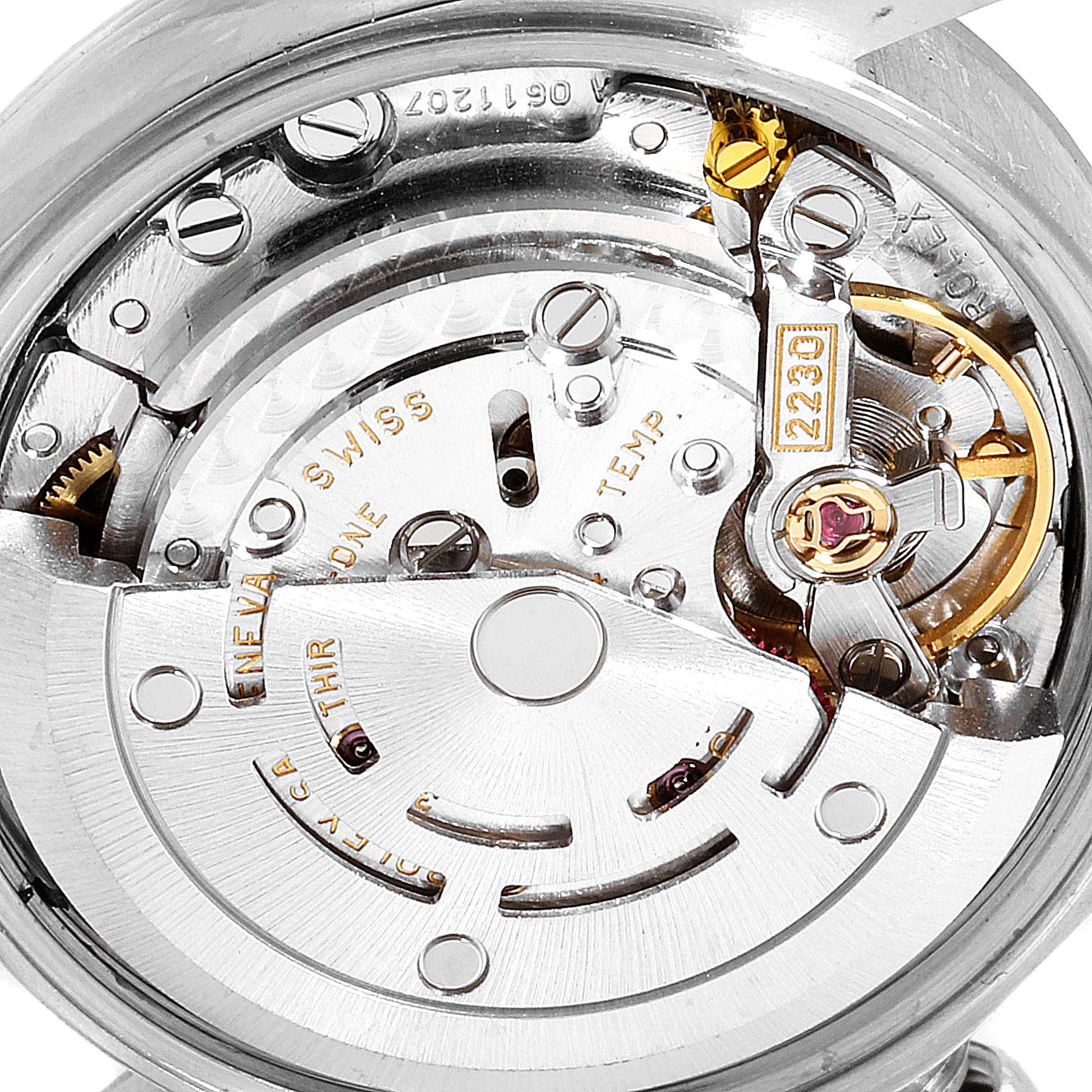 The image shows an up-close, detailed view of the Rolex Oyster Perpetual 76094 Women
s Stainless Steel White Dial 76094 Women
s Stainless Steel White Dial watch movement and internal mechanism.